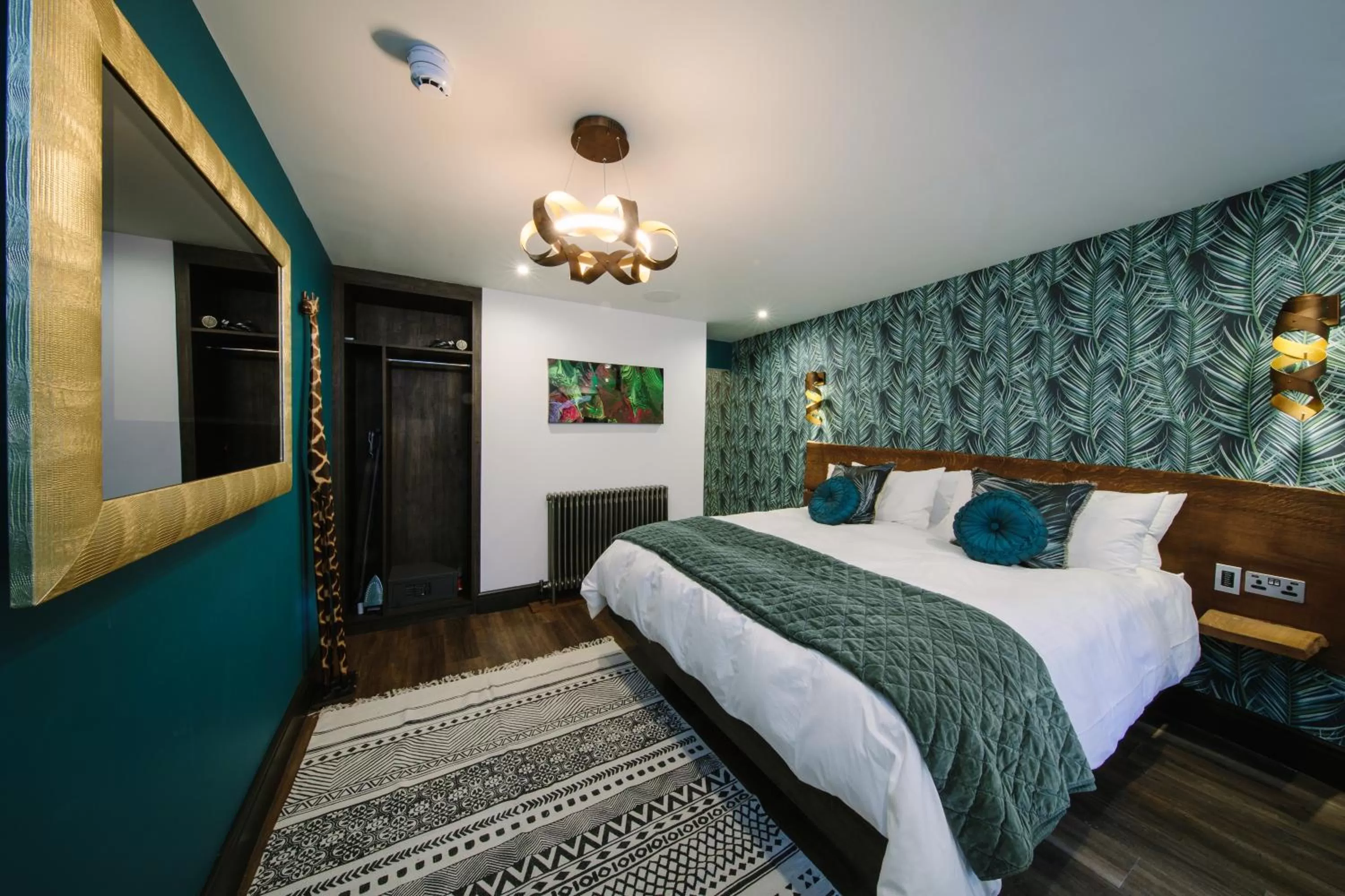 Bed in Absoluxe Suites