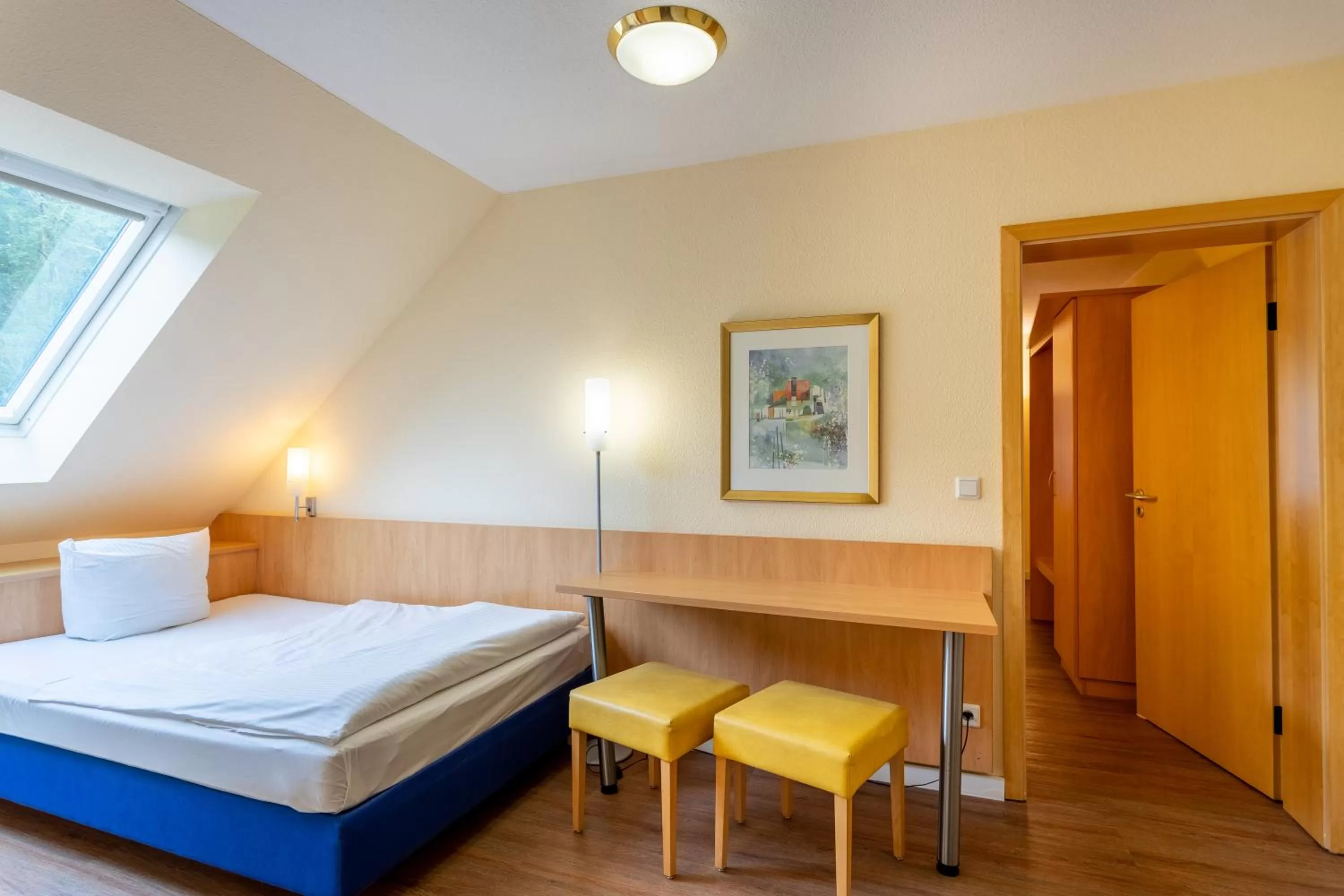 Photo of the whole room, Bed in Waldhotel Eskeshof