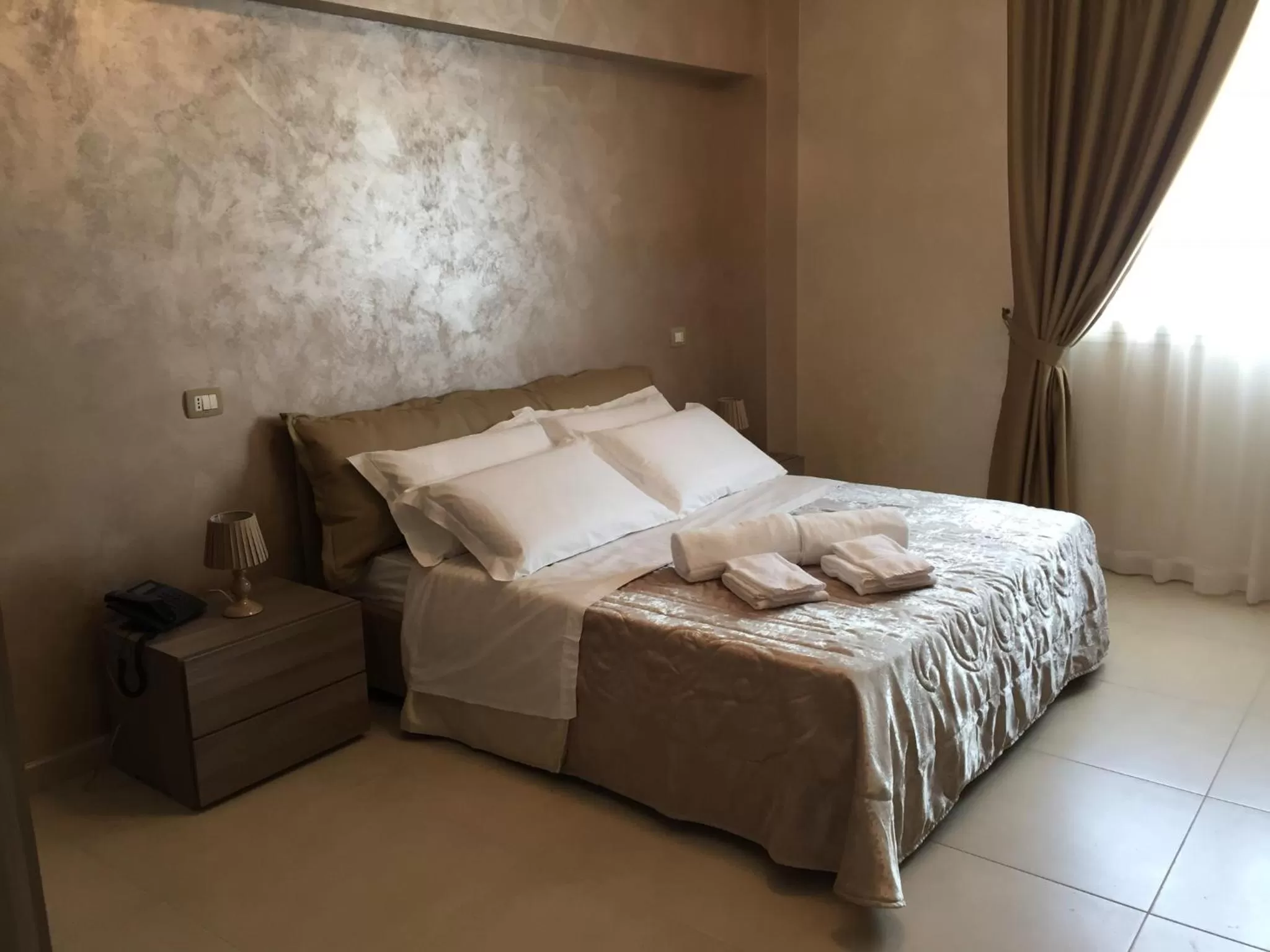 Bed in Hotel Riviera Palace