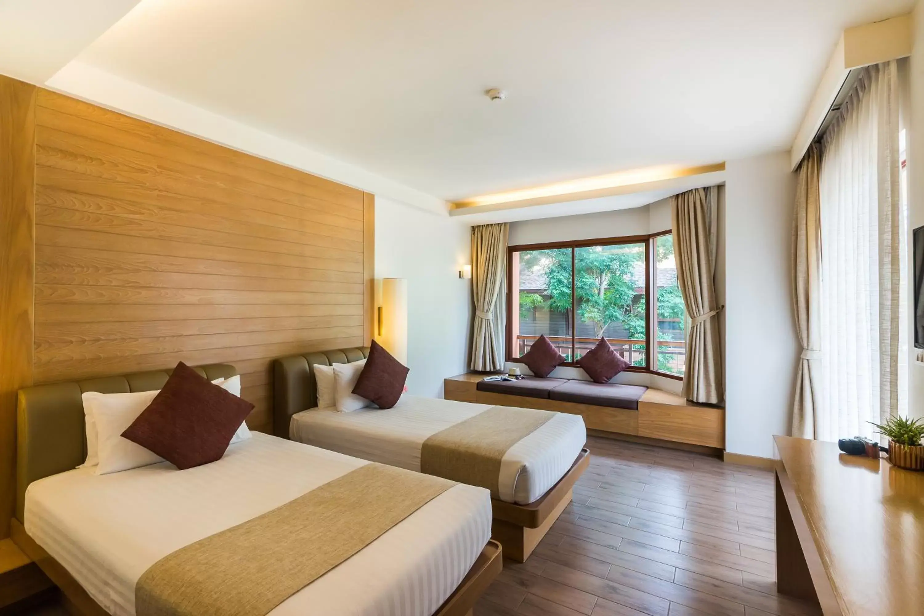 Bed in Ayrest Hua Hin Hotel