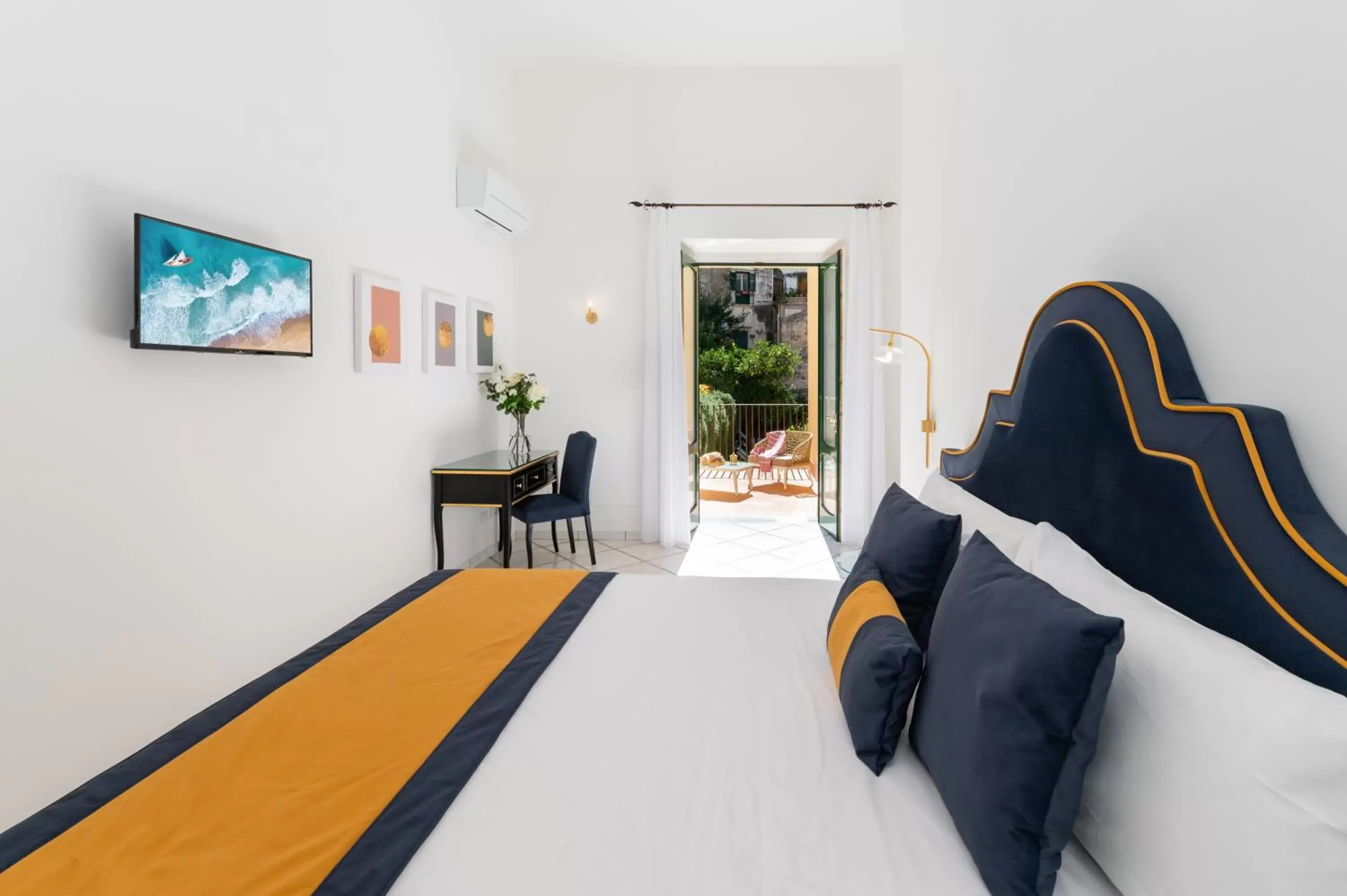 Patio, Bed in Amalfi Resort