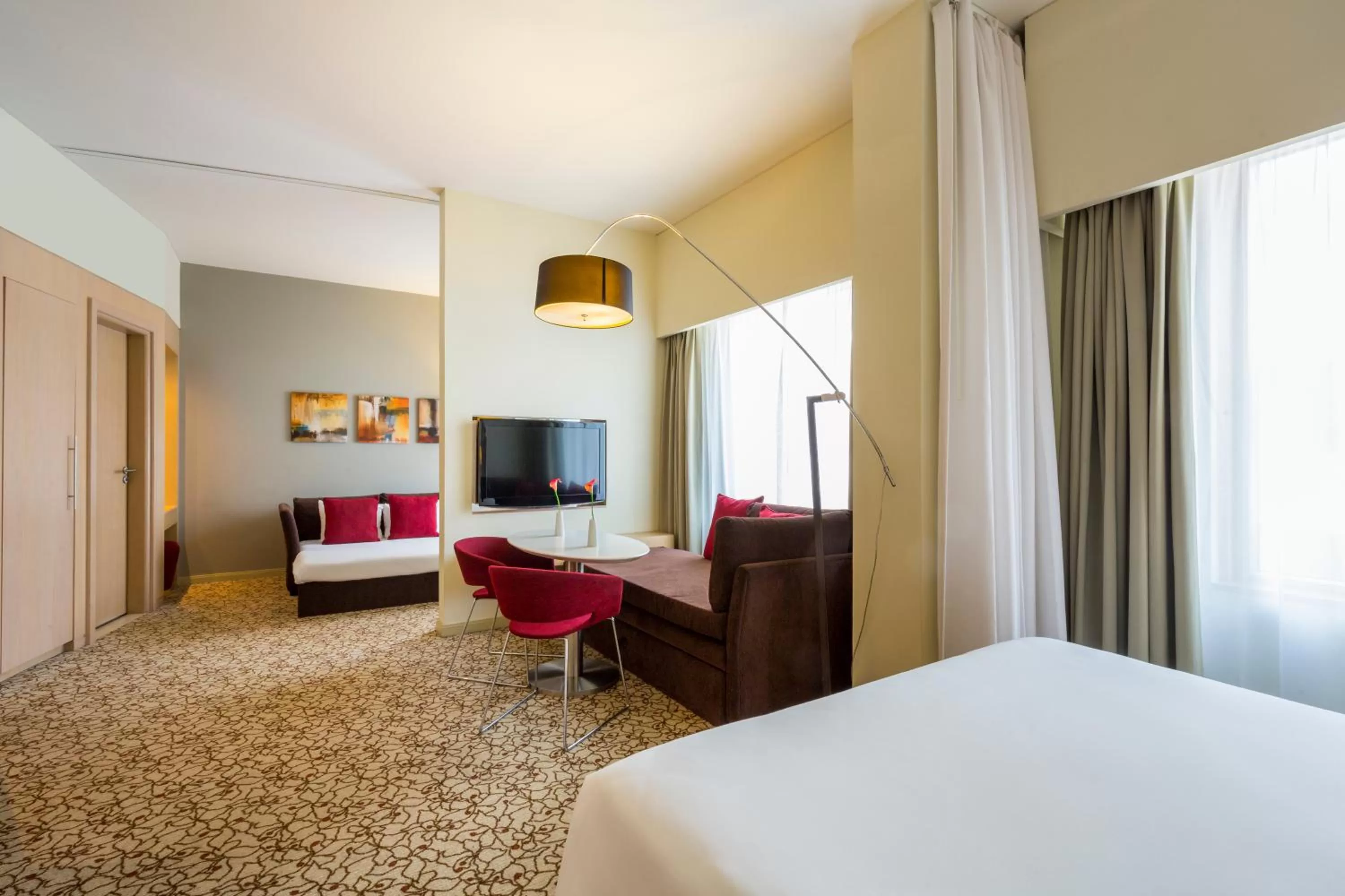 Bedroom, Bed in Novotel Suites Mall Avenue Dubai