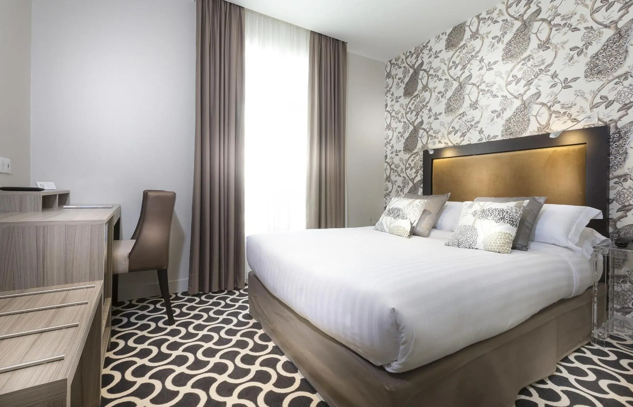 Bed in Hotel International Paris