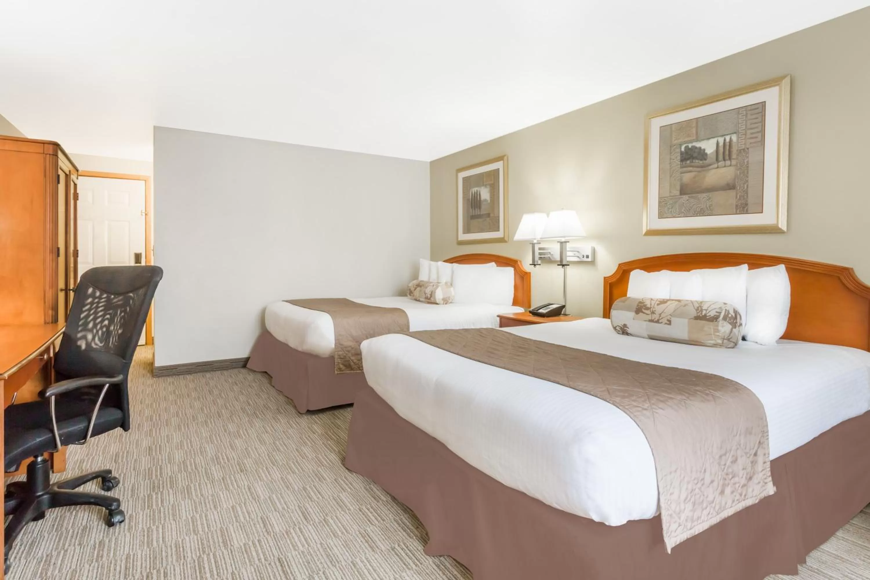 Bedroom, Bed in Ramada by Wyndham Ely