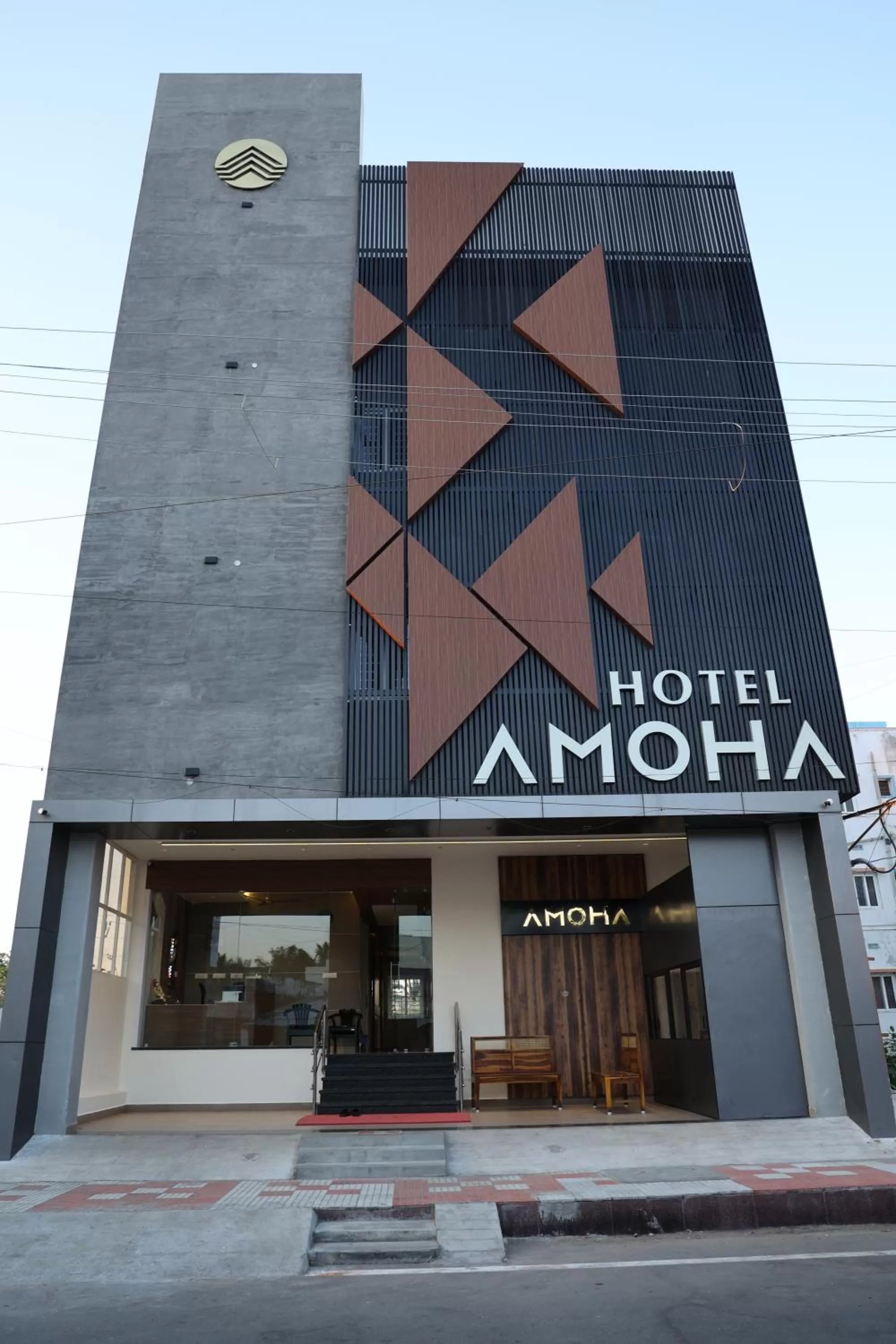 Property logo or sign in Hotel Amoha