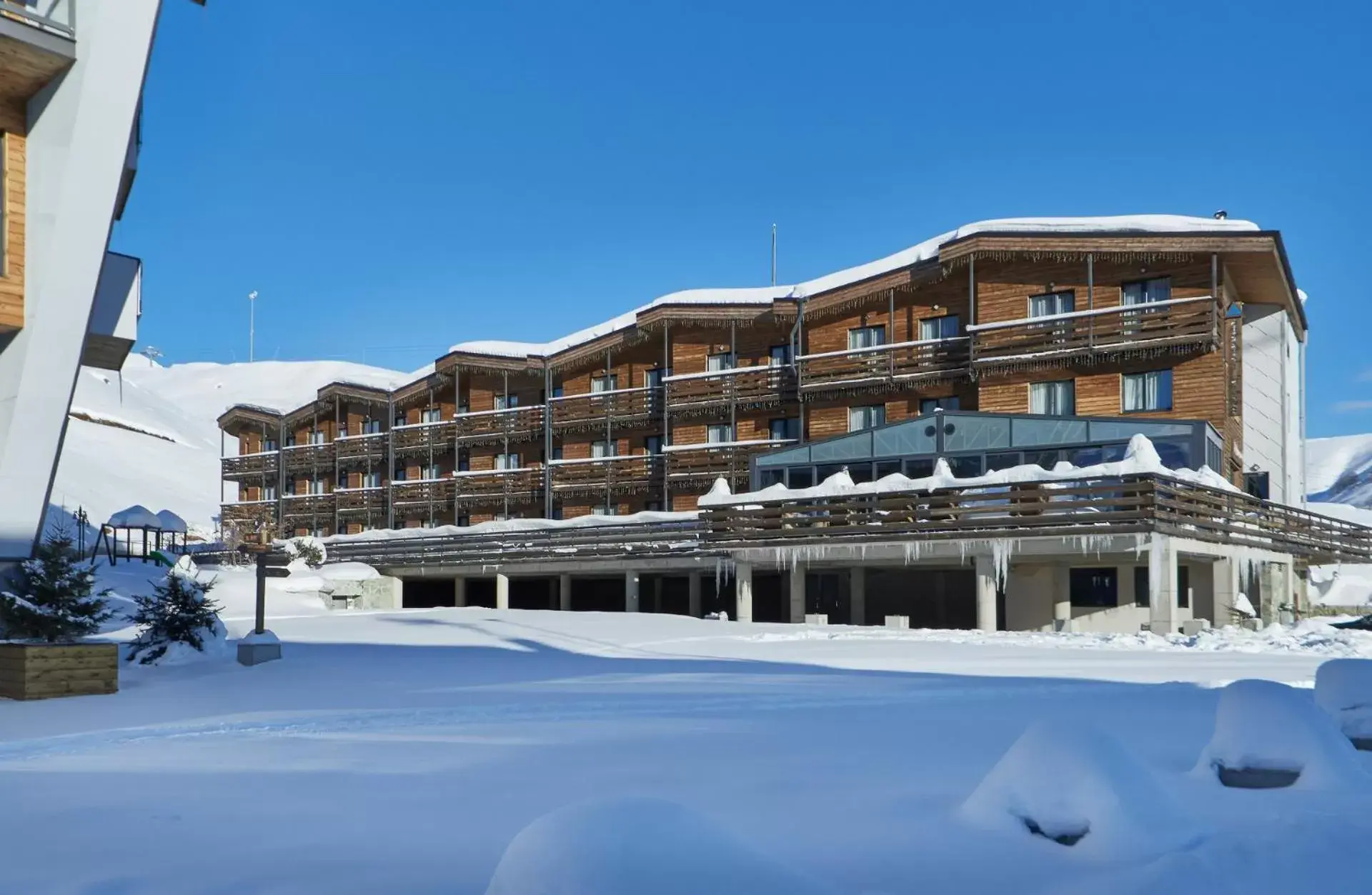 Property building, Winter in Gudauri Hills Apart Hotel