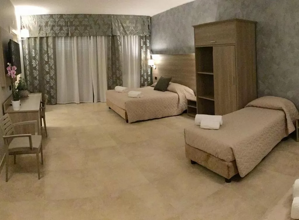 Bed in La Giummara Rooms