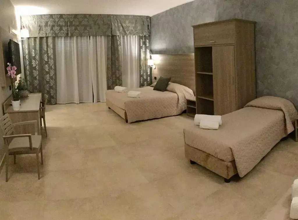 Bed in La Giummara Rooms
