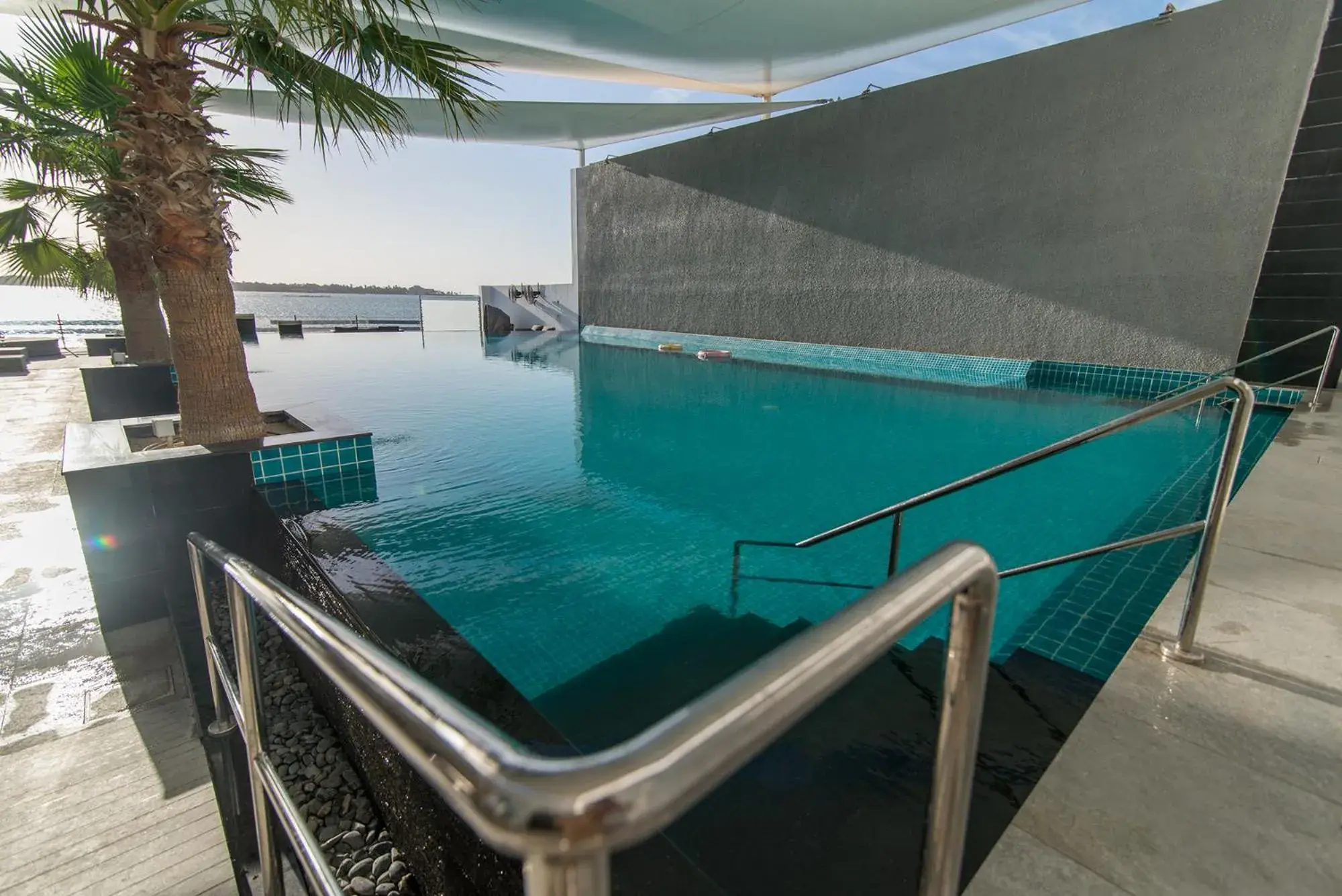 Swimming pool in Lagoona Beach Luxury Resort And Spa