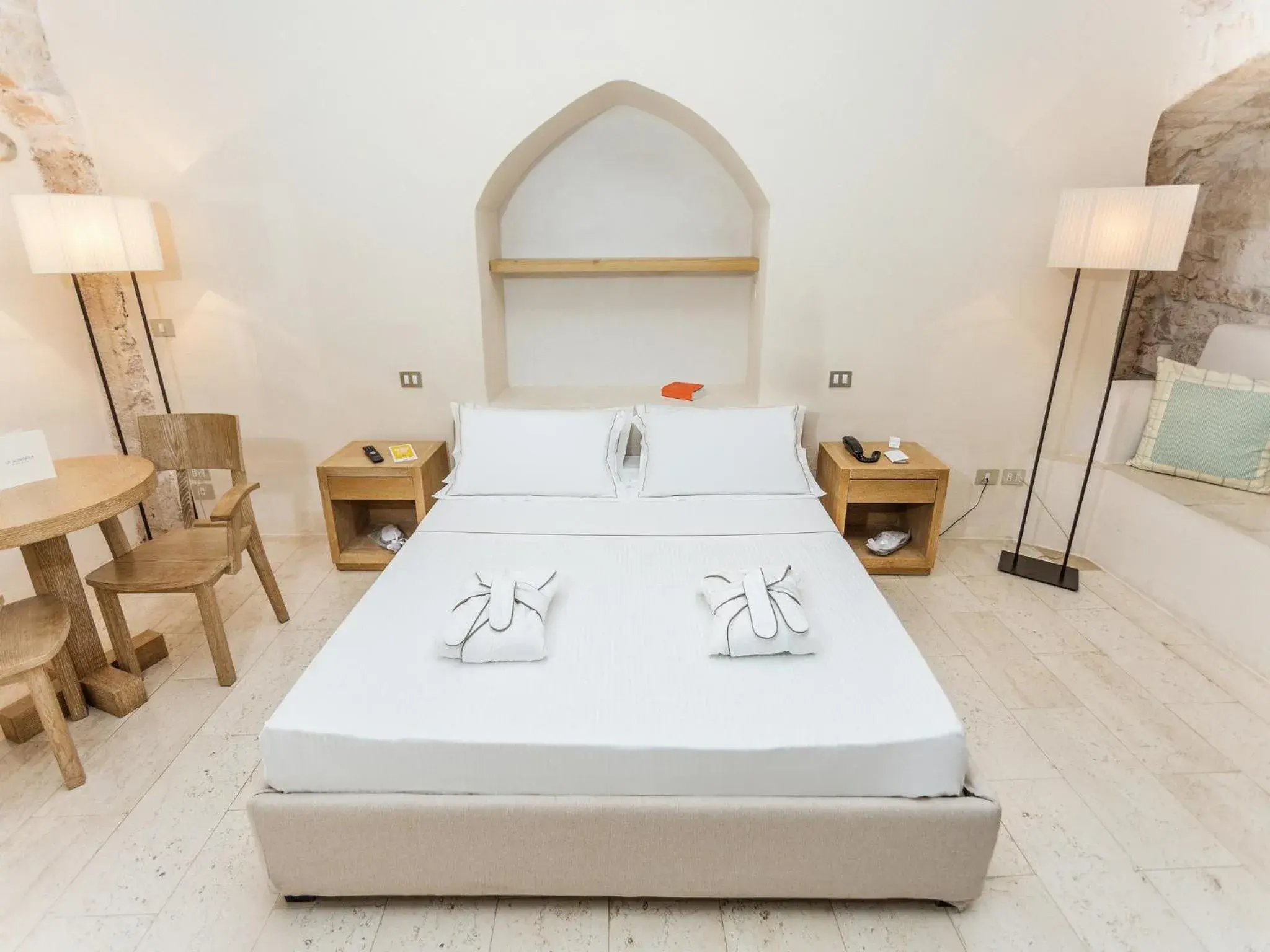 Bed in La Sommita Relais & Chateaux