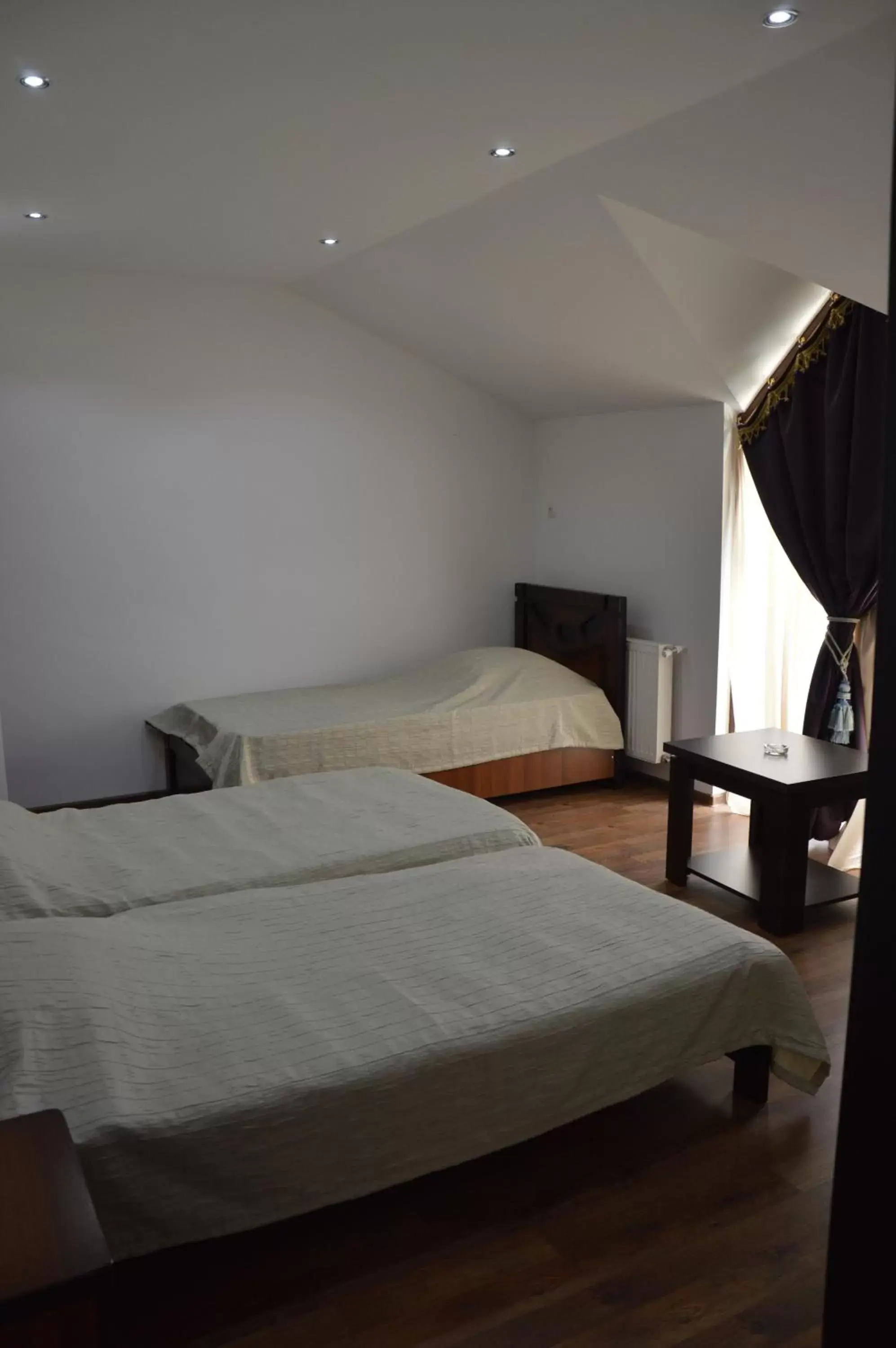 Standard Triple Room in Hotel Bagineti Standard Triple Room in Hotel Bagineti