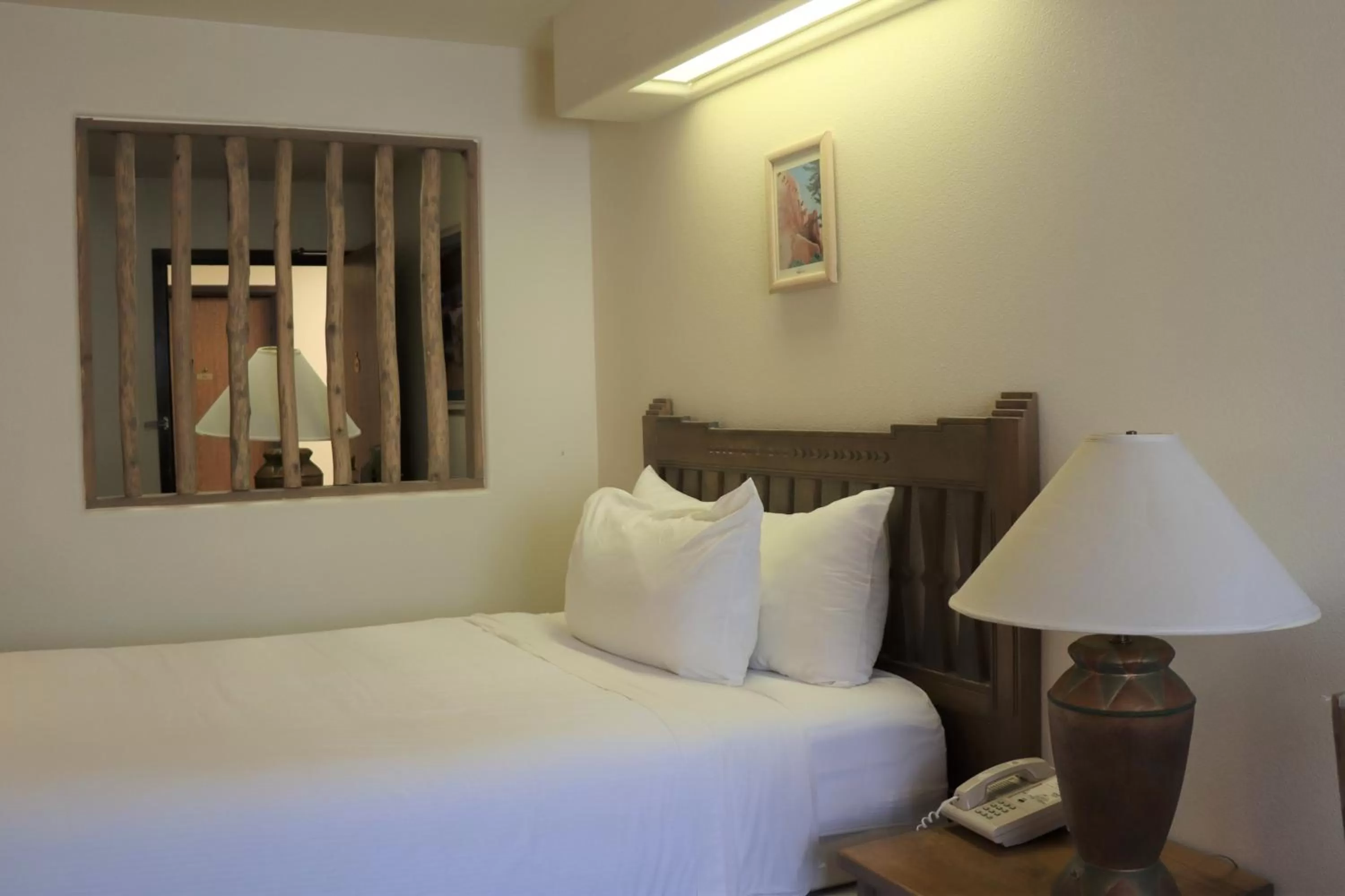 Bed in Sagebrush Inn & Suites