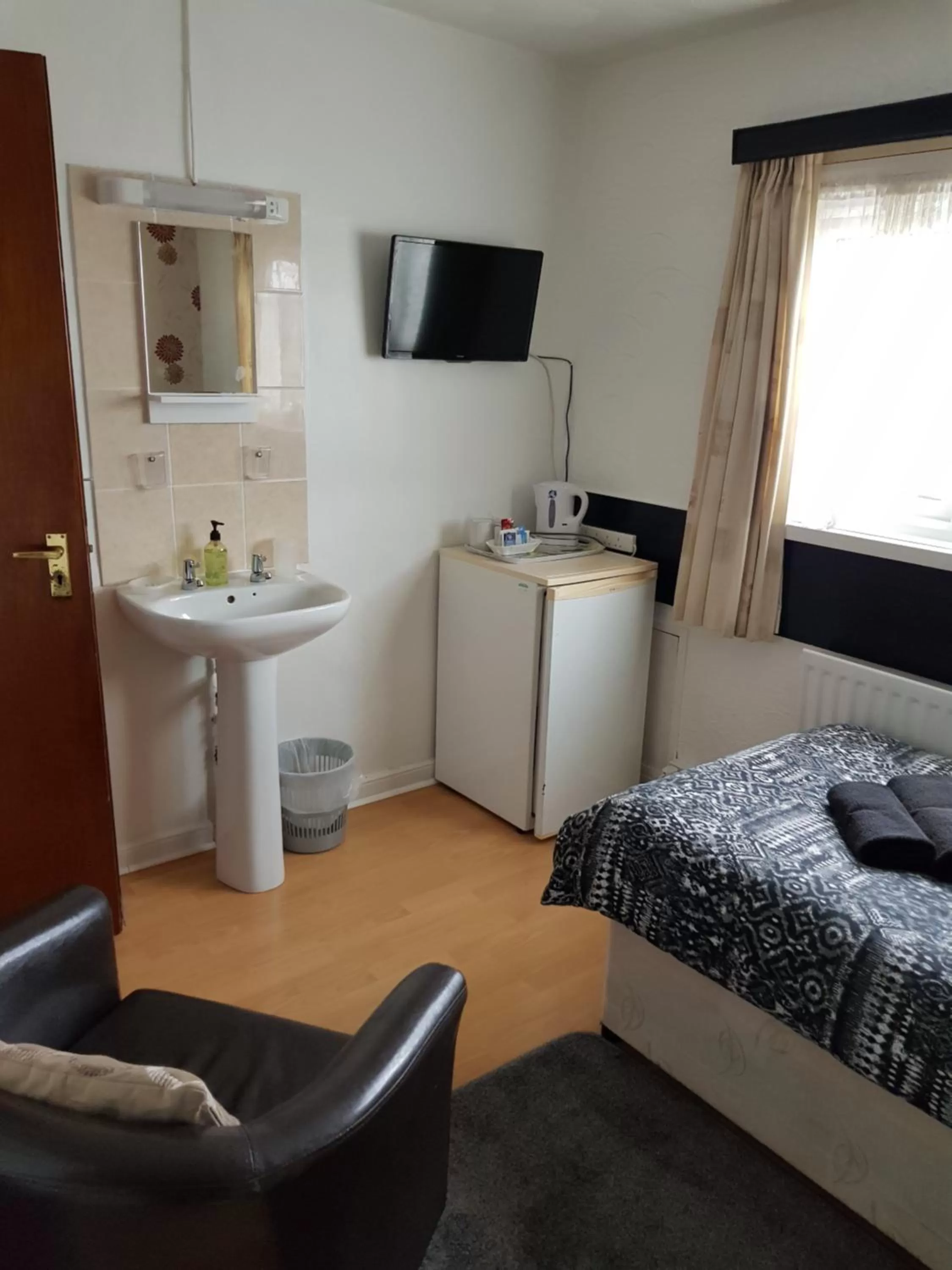 Bed in Sunnyside Hotel