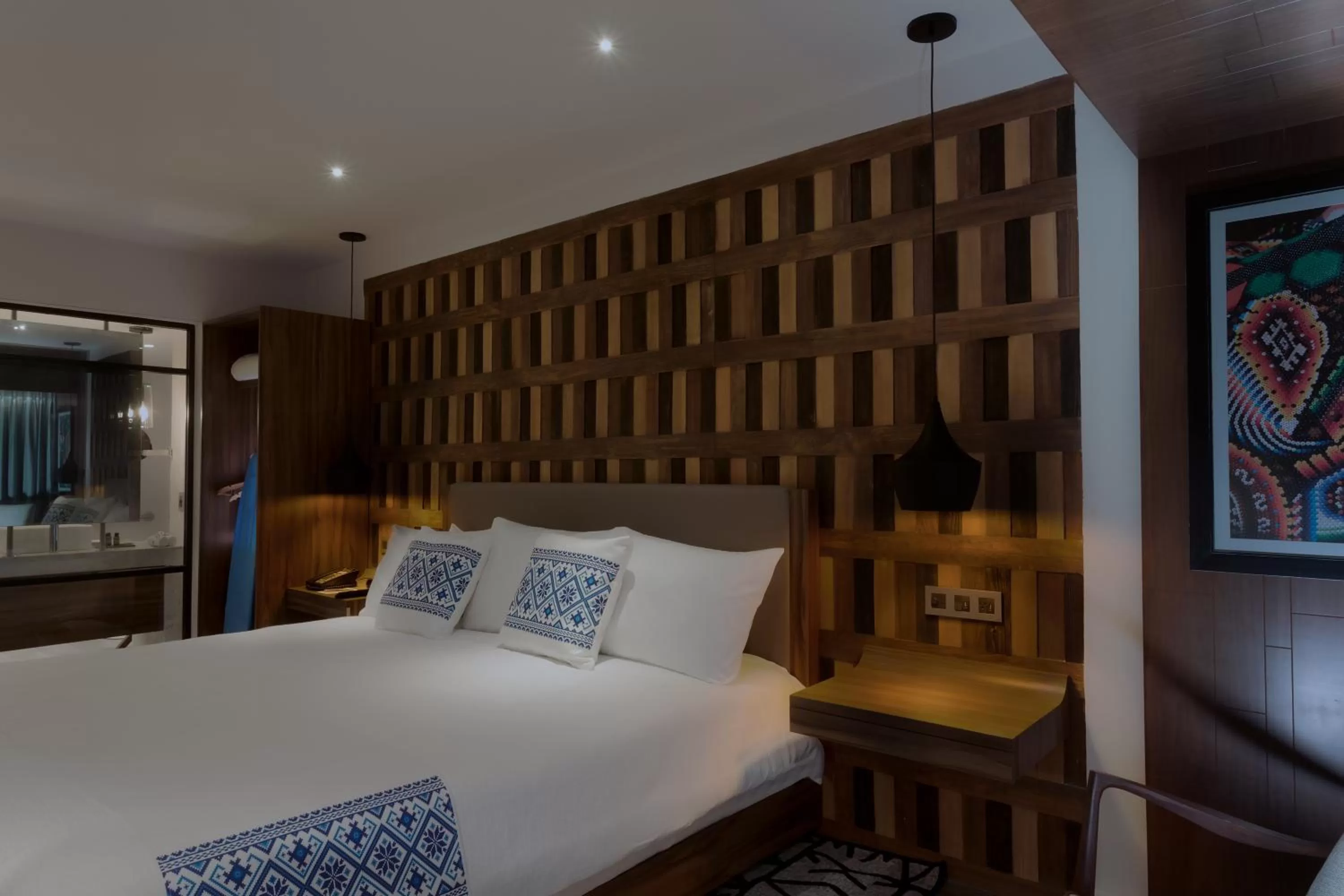 Bed in Hotel Indigo Guadalajara Expo by IHG