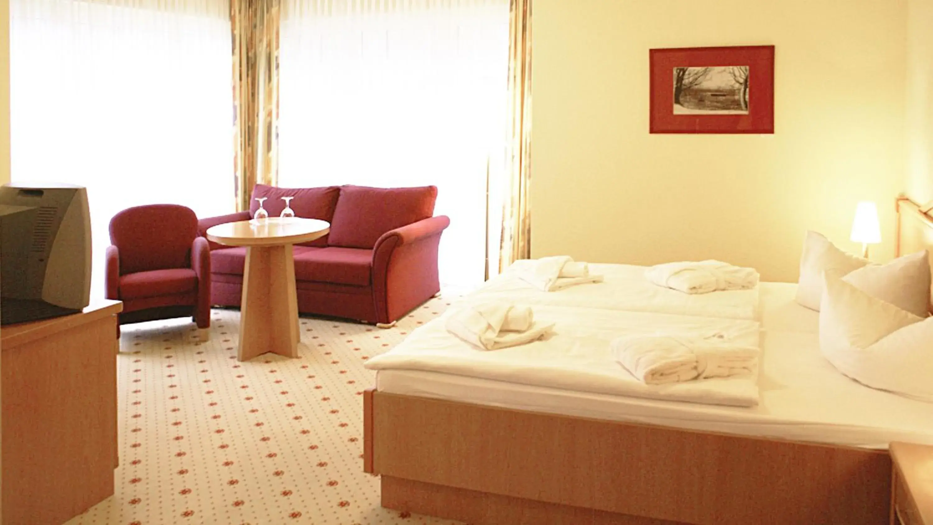 Living room, Bed in Ostseehotel Villen im Park - ein Rovell Hotel