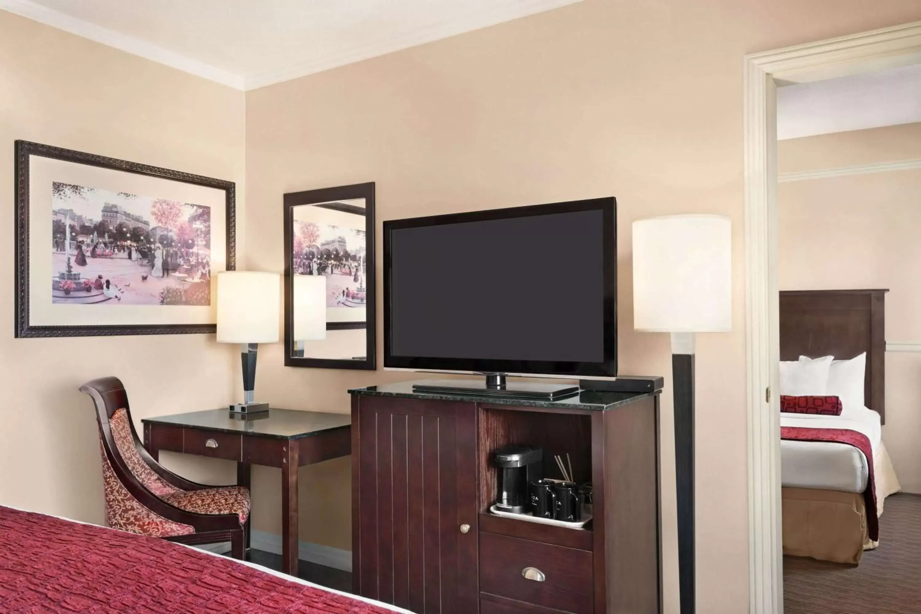 Photo of the whole room, TV/Entertainment Center in The Plaza Hotel a Trademark Collection by Wyndham