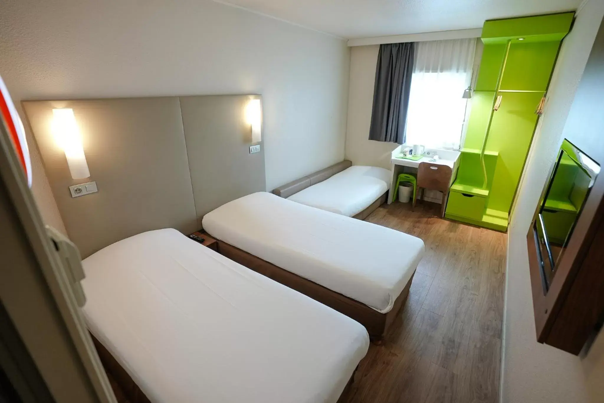 Photo of the whole room, Bed in Hotel Campanile Roissy