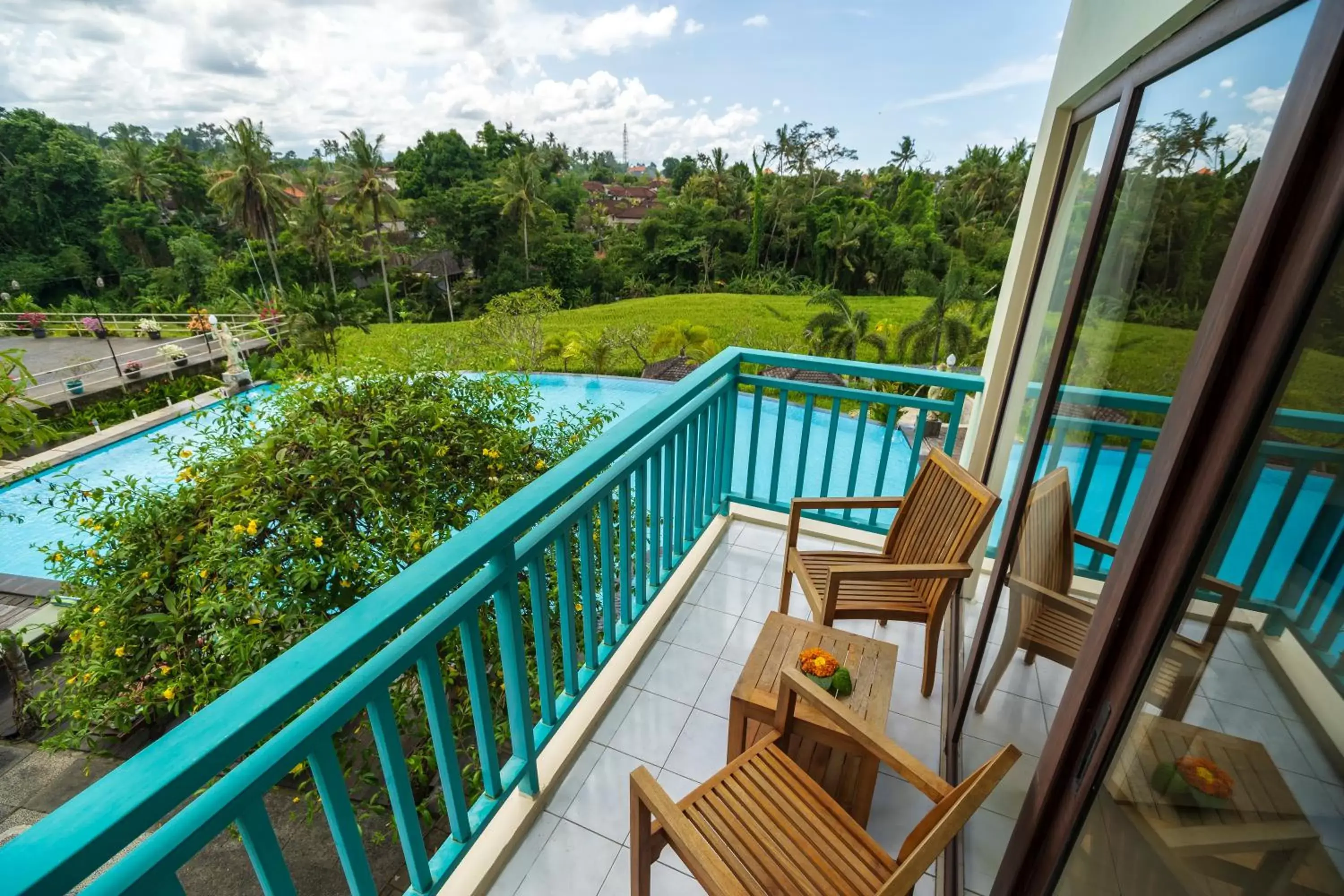 Balcony/Terrace, Pool View in Amatara Royal Ganesha