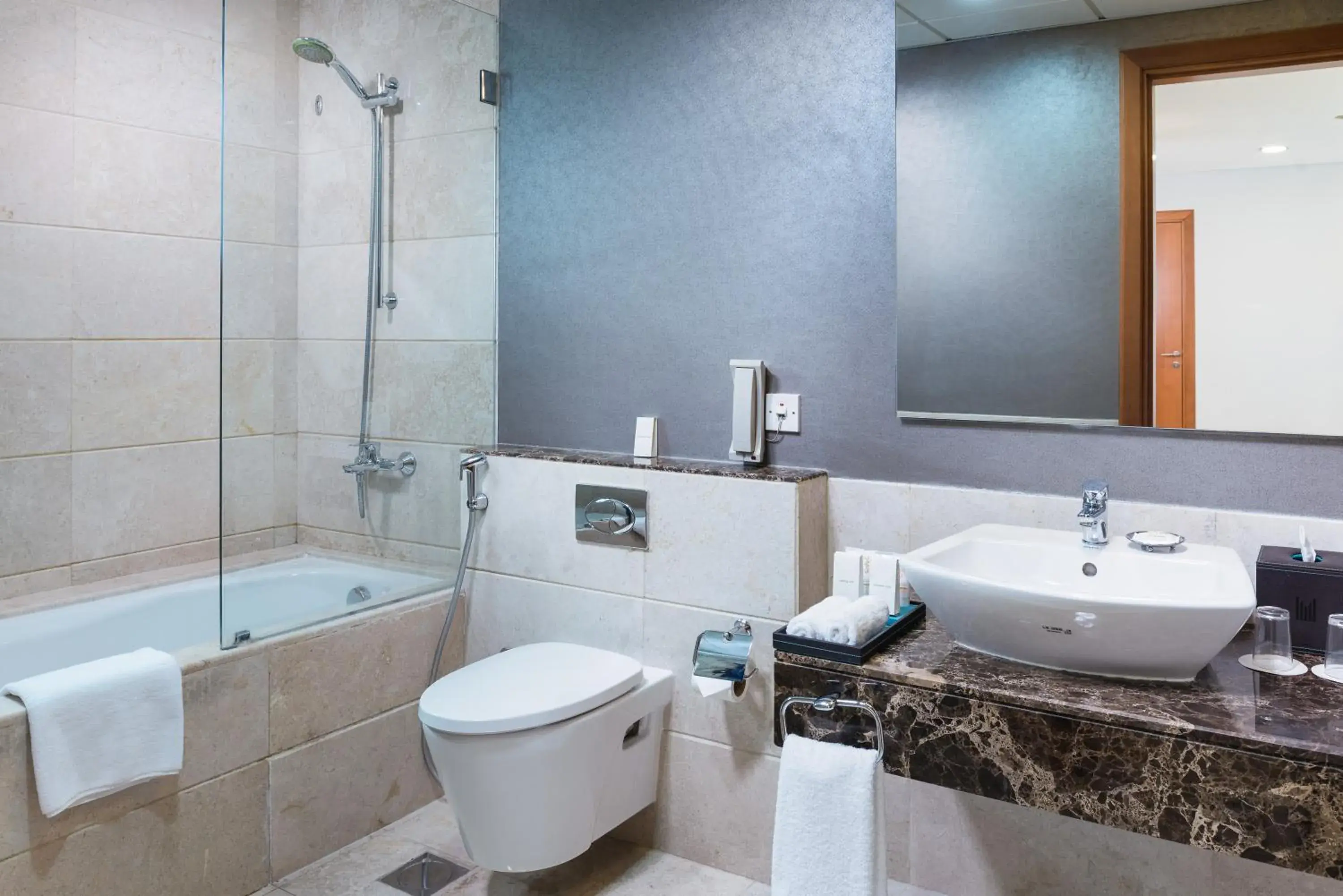 Bathroom in Millennium Executive Apartments Muscat