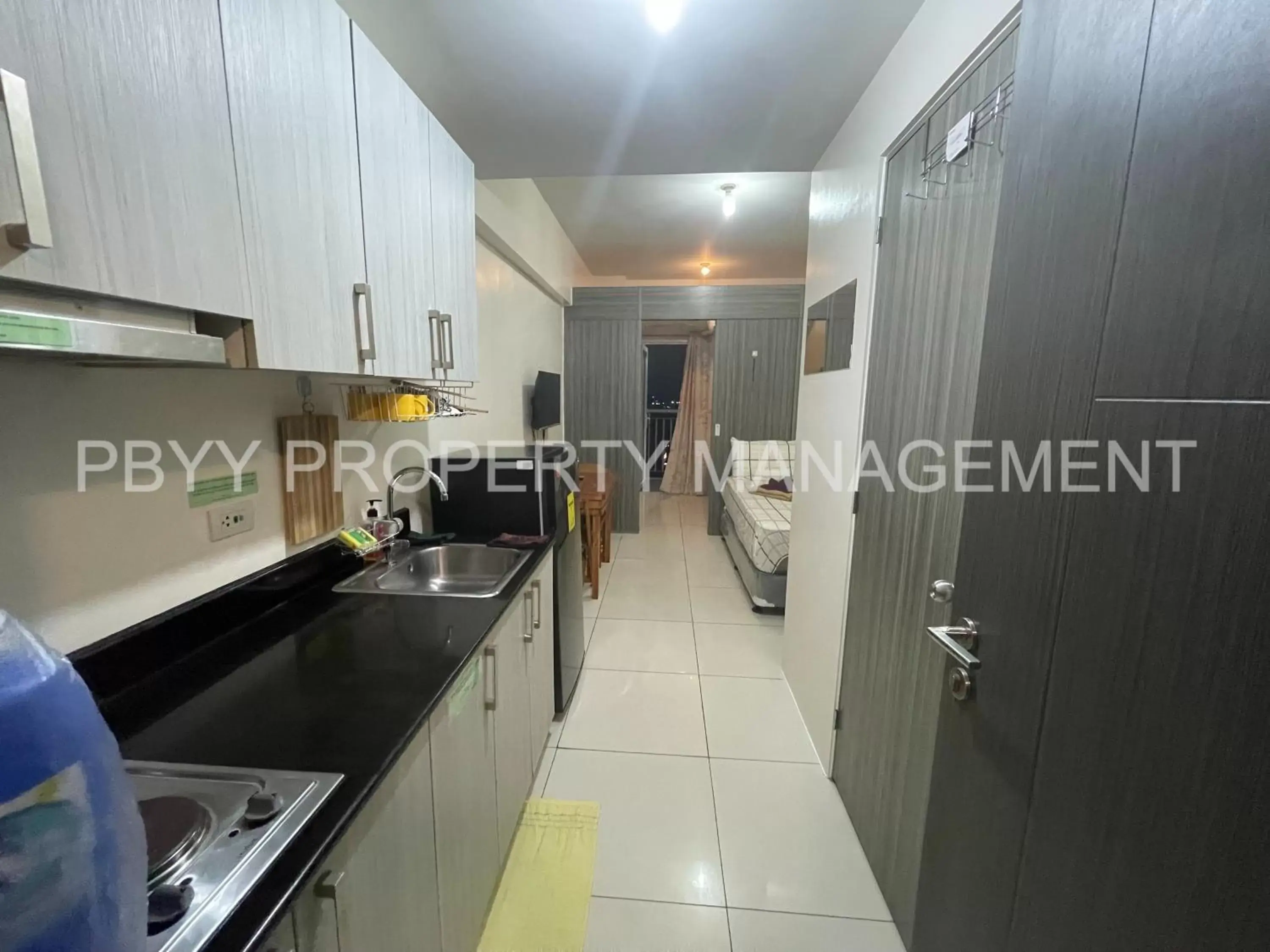 Kitchen or kitchenette, Kitchen/Kitchenette in Green Residences Staycation by PBYY Kitchen or kitchenette, Kitchen/Kitchenette in Green Residences Staycation by PBYY