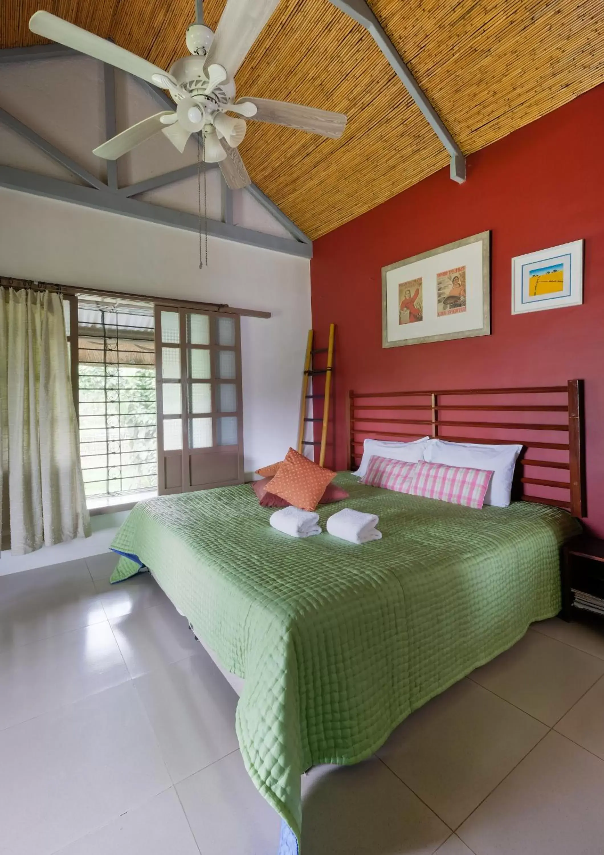 Bed in The Duyan House at Sinagtala Resort