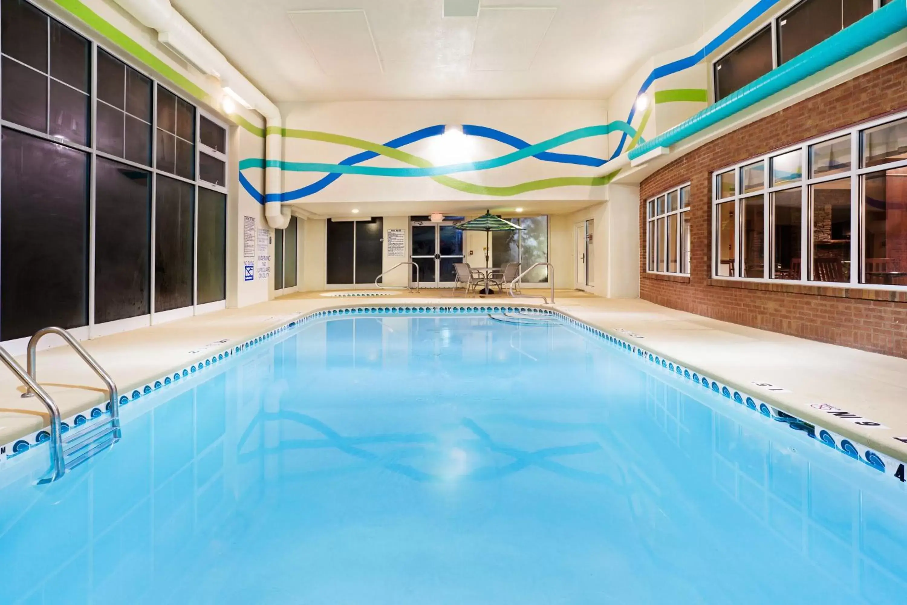 Swimming Pool in Holiday Inn Express & Suites Sylva / Dillsboro, an IHG Hotel