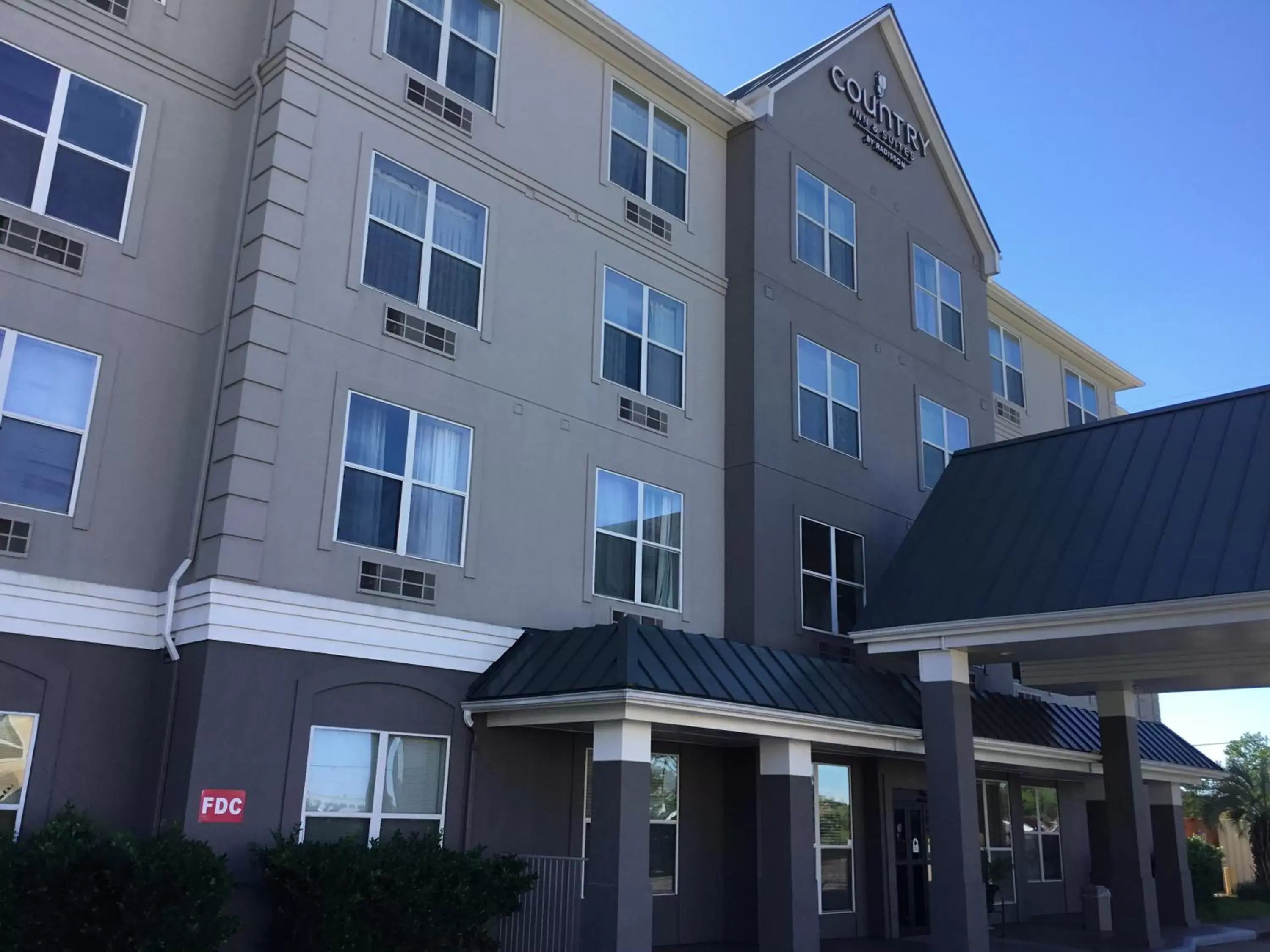 Facade/entrance in Country Inn & Suites By Radisson, Houston IAH Airport-JFK Boulevard