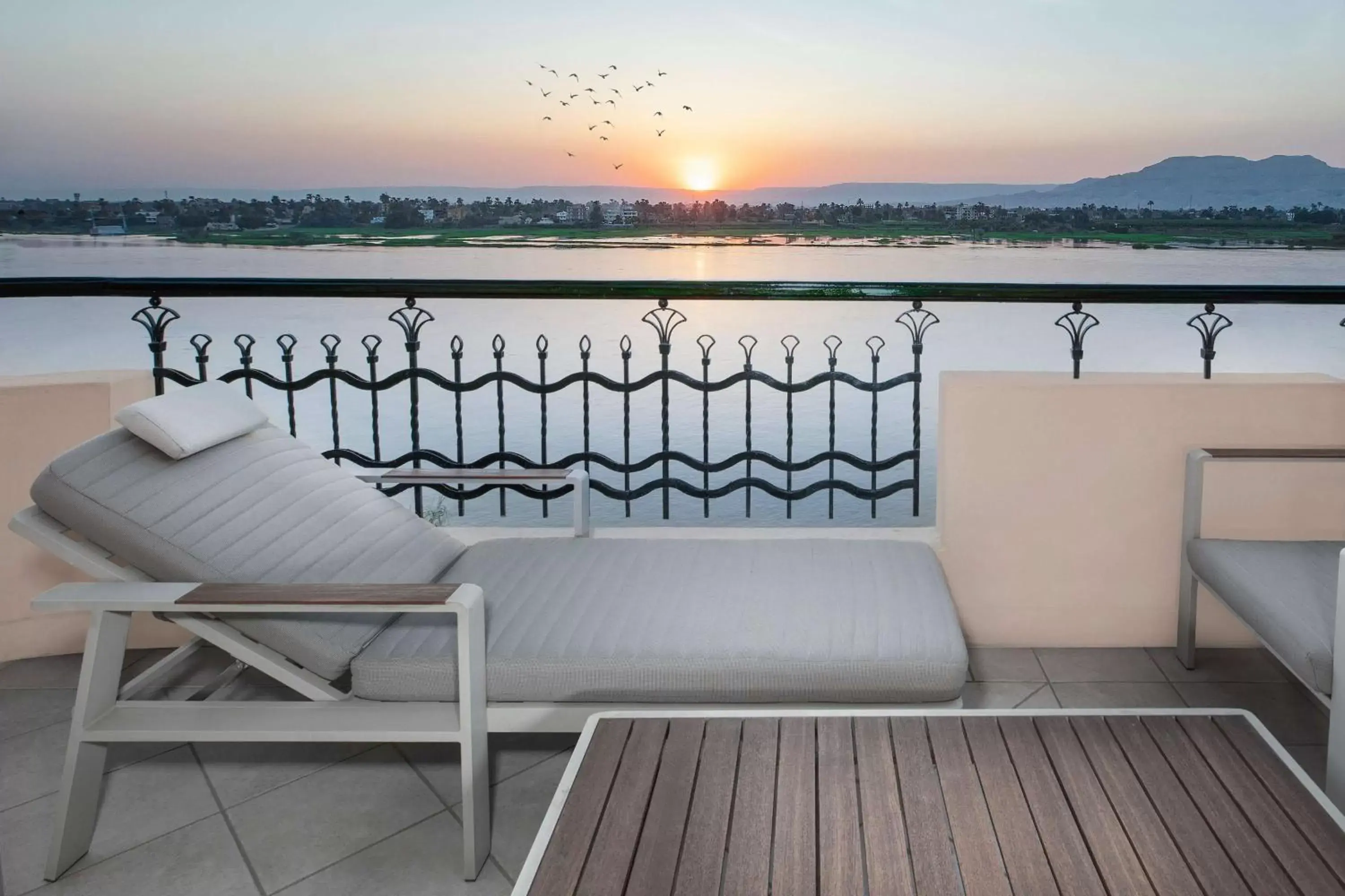 Bedroom, Balcony/Terrace in Steigenberger Nile Palace Luxor - Convention Center