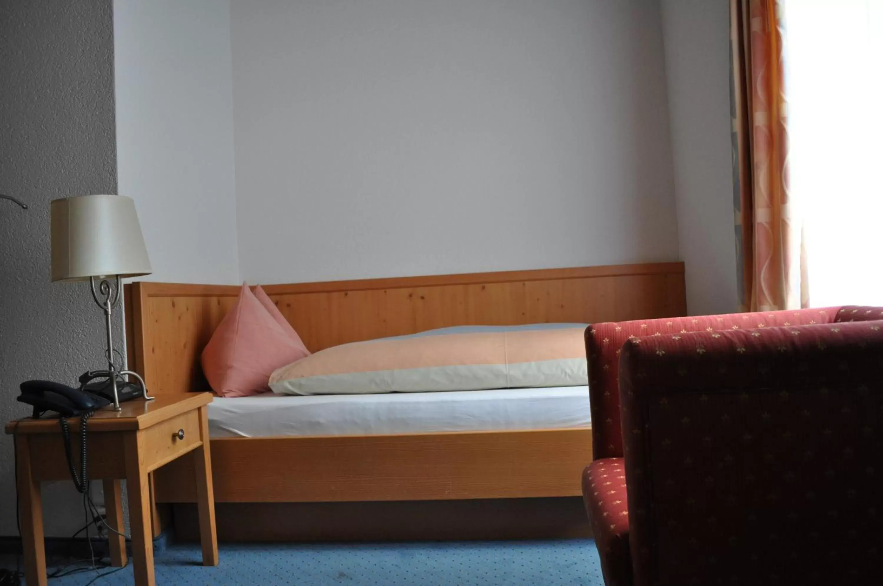 Bed, Seating Area in Hotel Engelberg "das Trail Hotel"