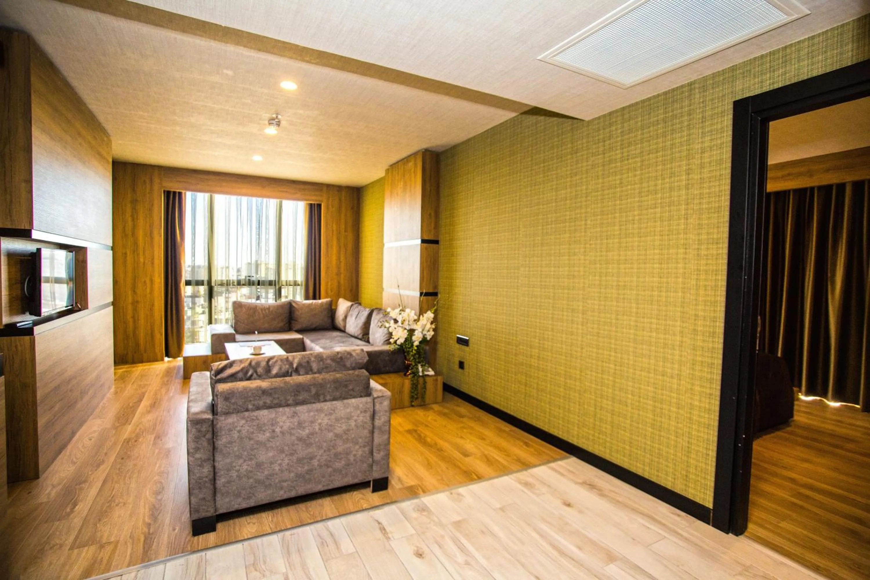 Living room in SKY Business Hotel