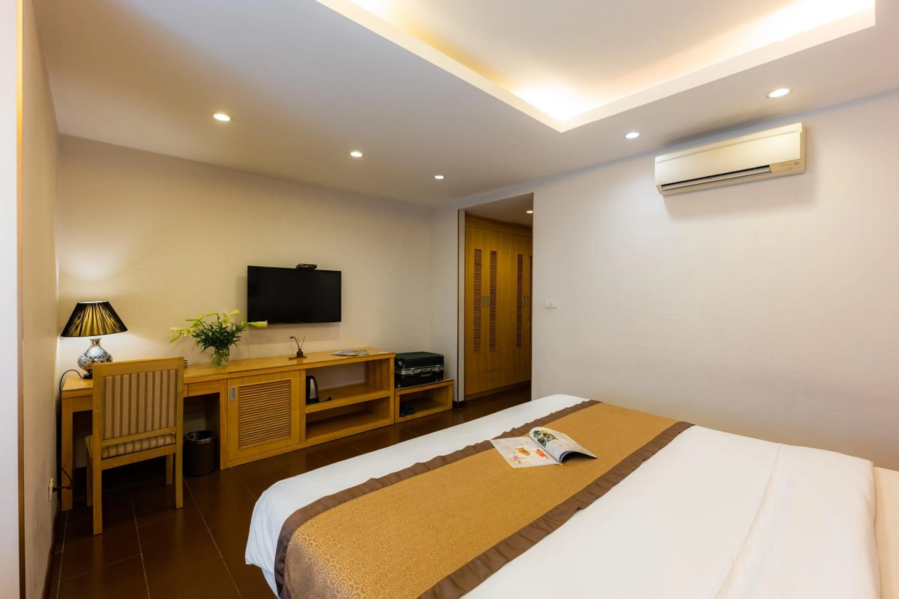 Bed in Riverside Hanoi Hotel