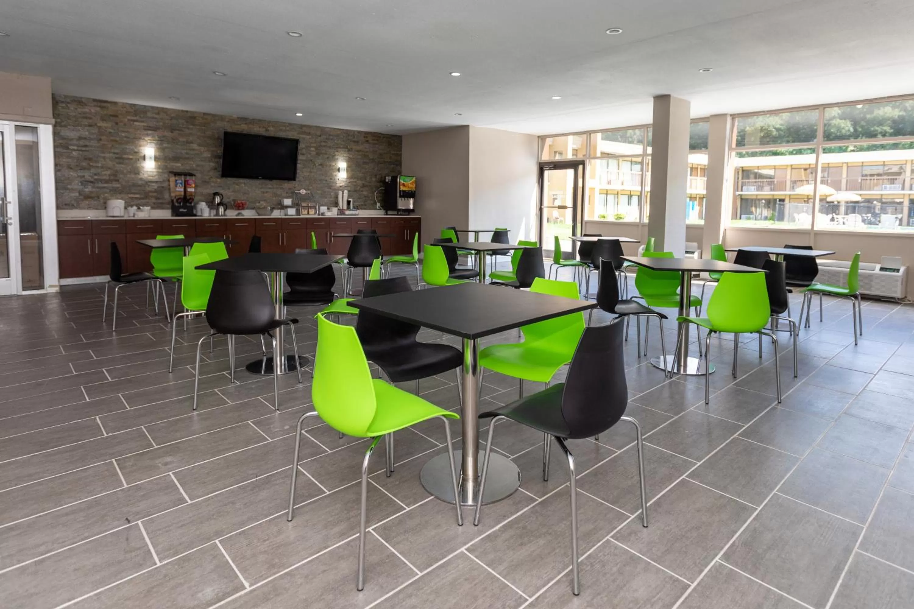 Communal lounge/ TV room in Super 8 by Wyndham Goldsboro