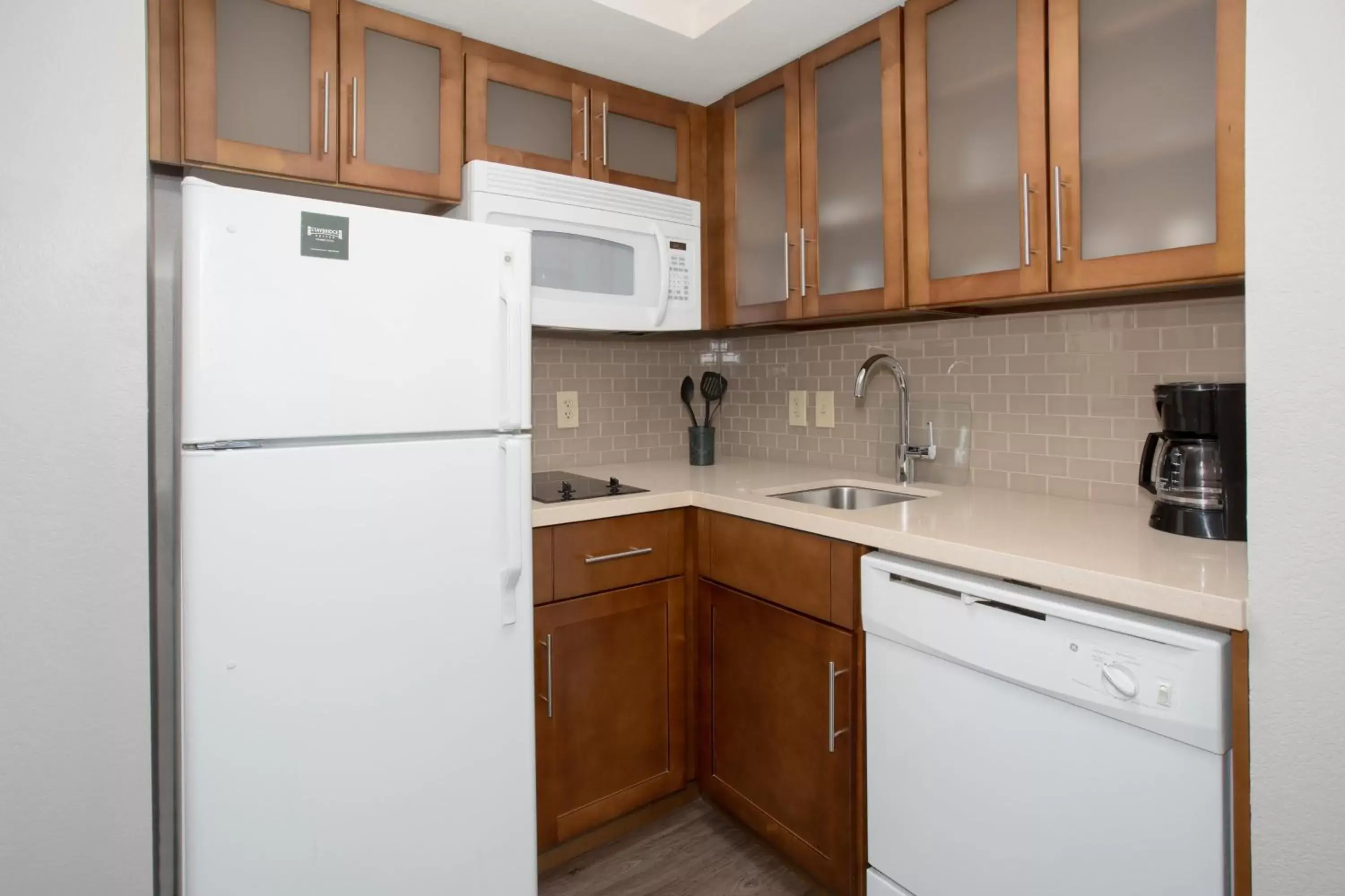 Photo of the whole room, Kitchen/Kitchenette in Staybridge Suites Denver International Airport, an IHG Hotel