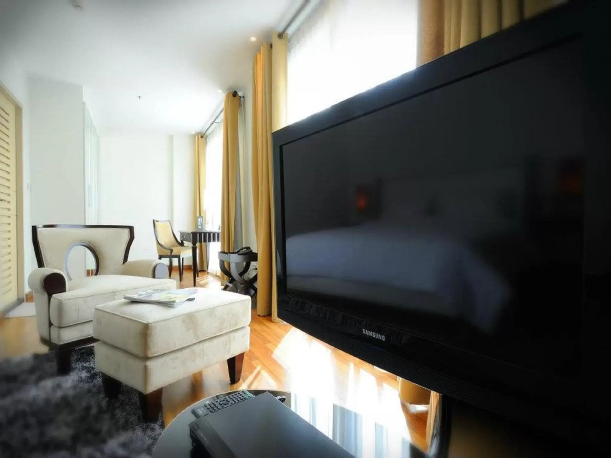 TV and multimedia, TV/Entertainment Center in The Bless Hotel and Residence