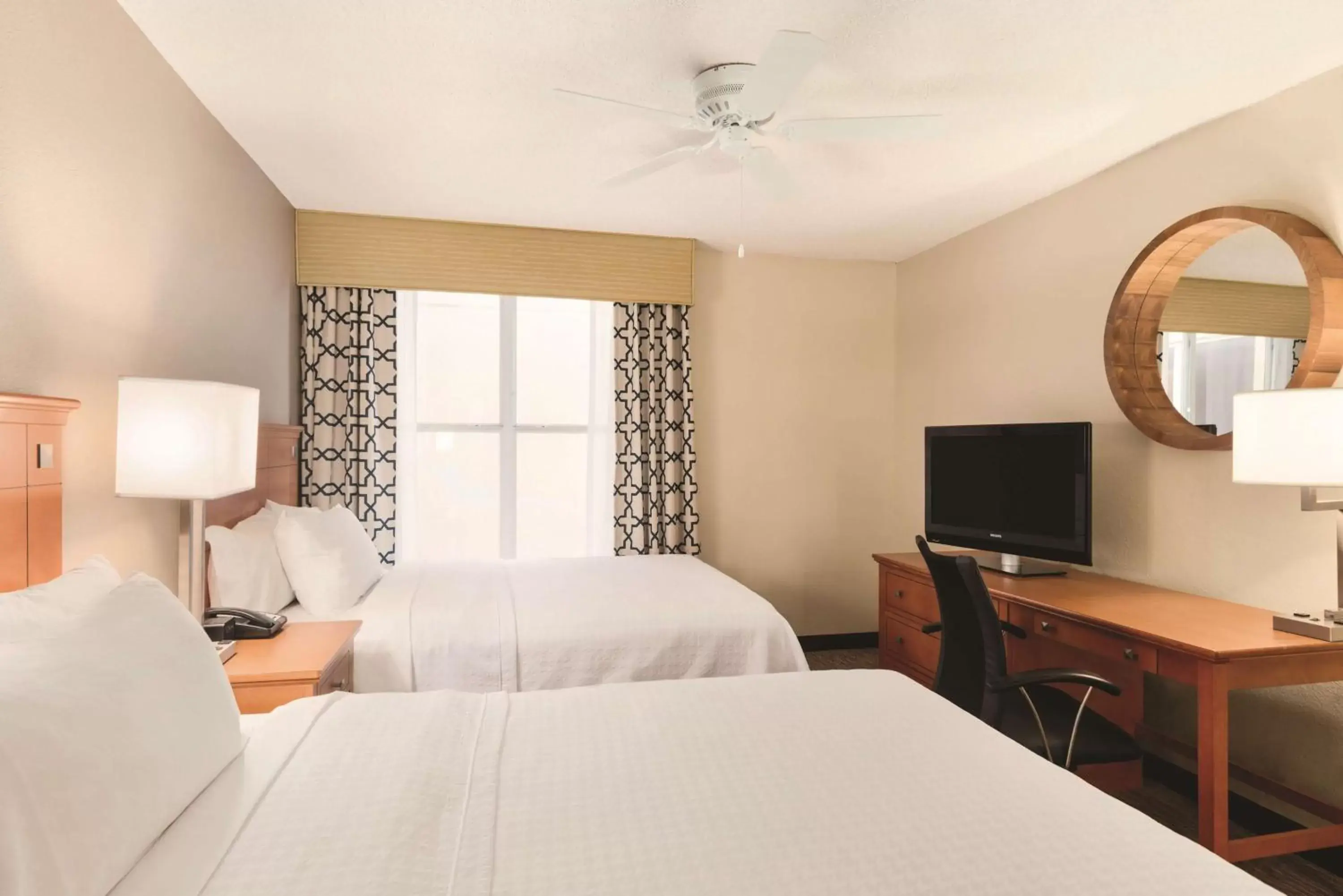 Bed in Homewood Suites by Hilton Orlando-Intl Drive/Convention Ctr