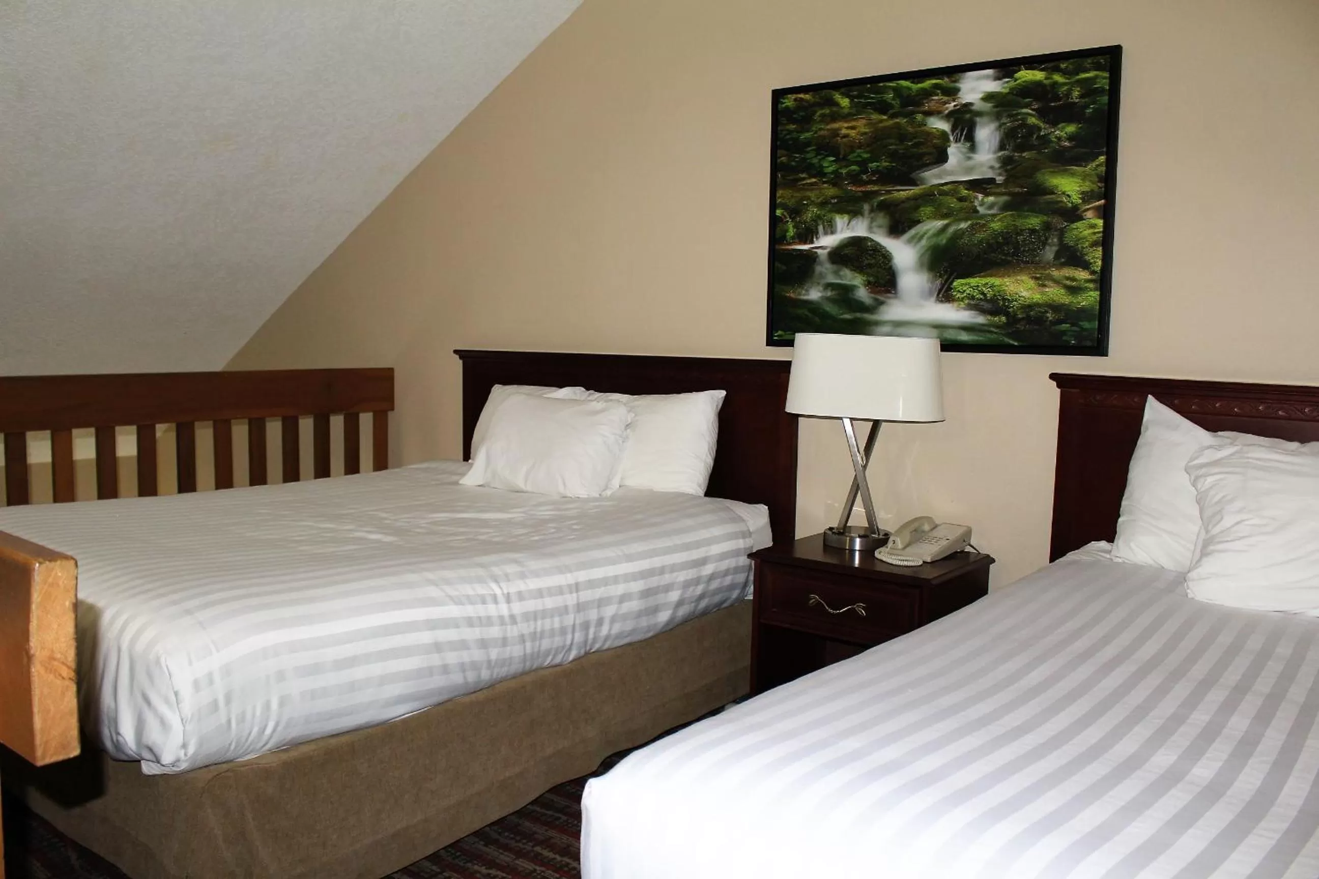 Bed in Ramada by Wyndham Campbell River