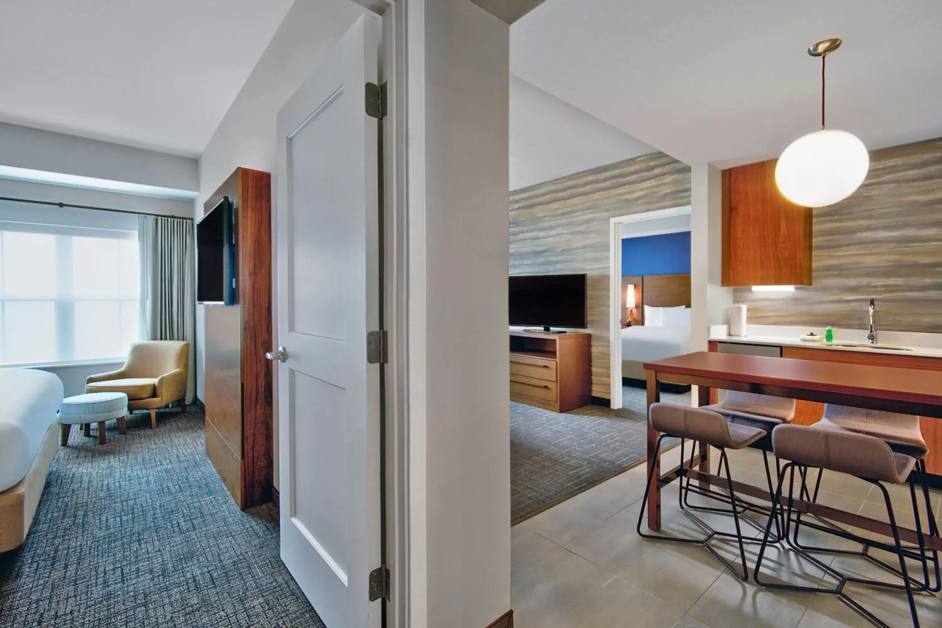 Bedroom in Residence Inn by Marriott Orlando at FLAMINGO CROSSINGS Town Center