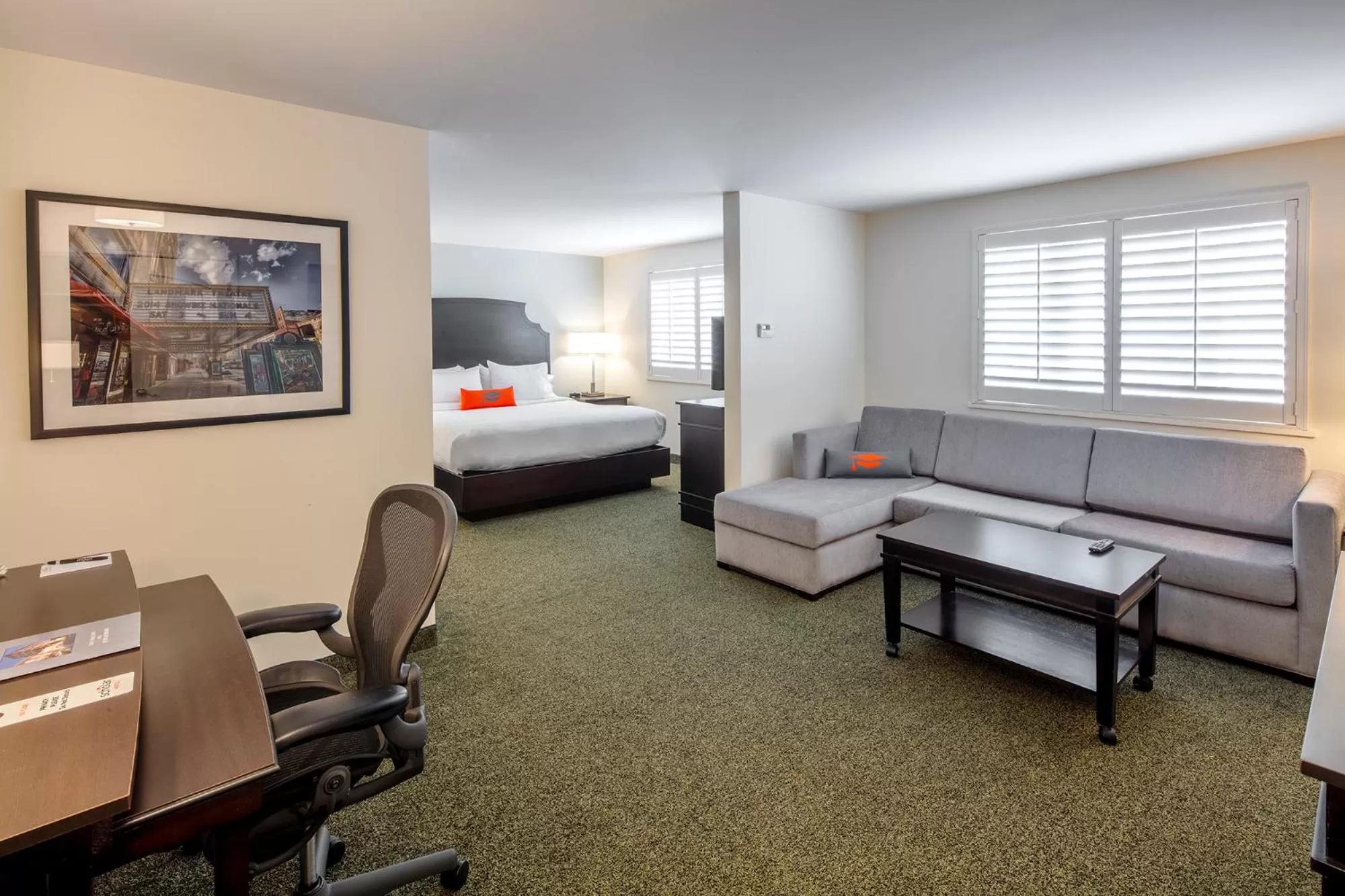 Seating area, Bed in Collegian Hotel & Suites, Trademark Collection by Wyndham