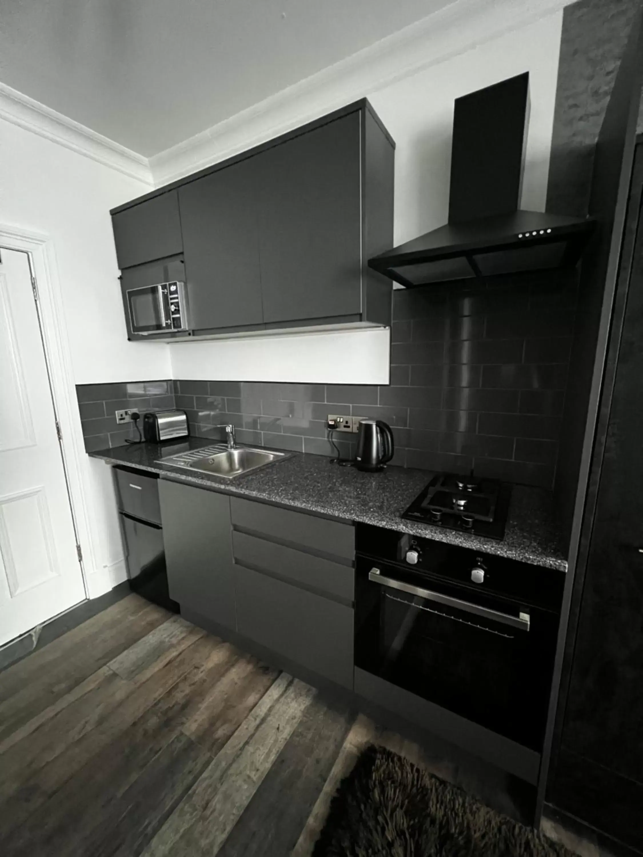 Kitchen/Kitchenette in Amani Apartments - Glasgow City Centre