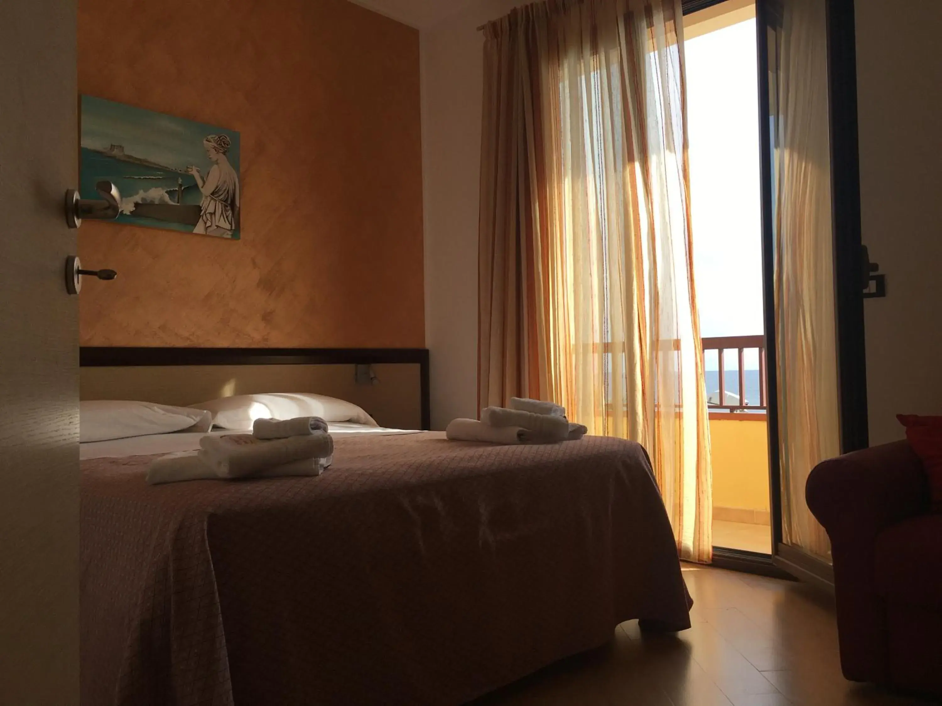Bed in Albergo Perseo