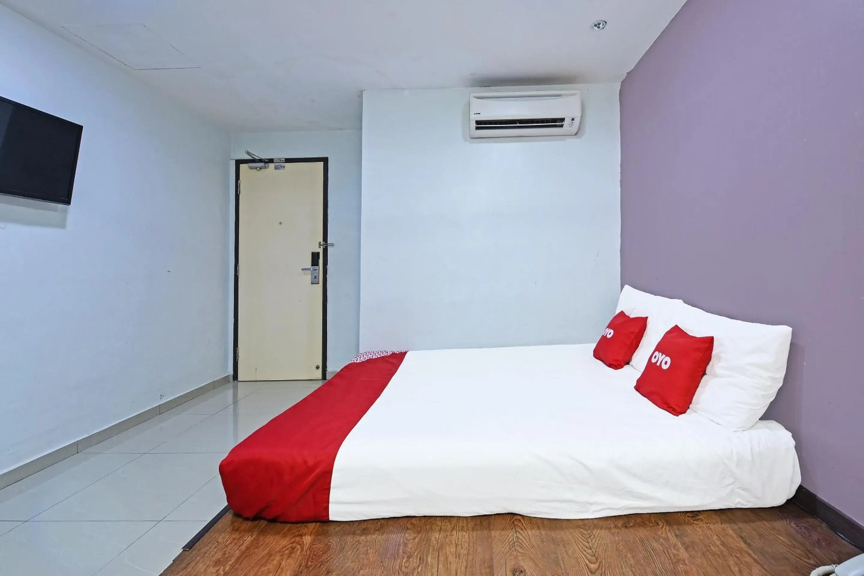 Bed in OYO 992 Orange Hotel Kuala Pilah