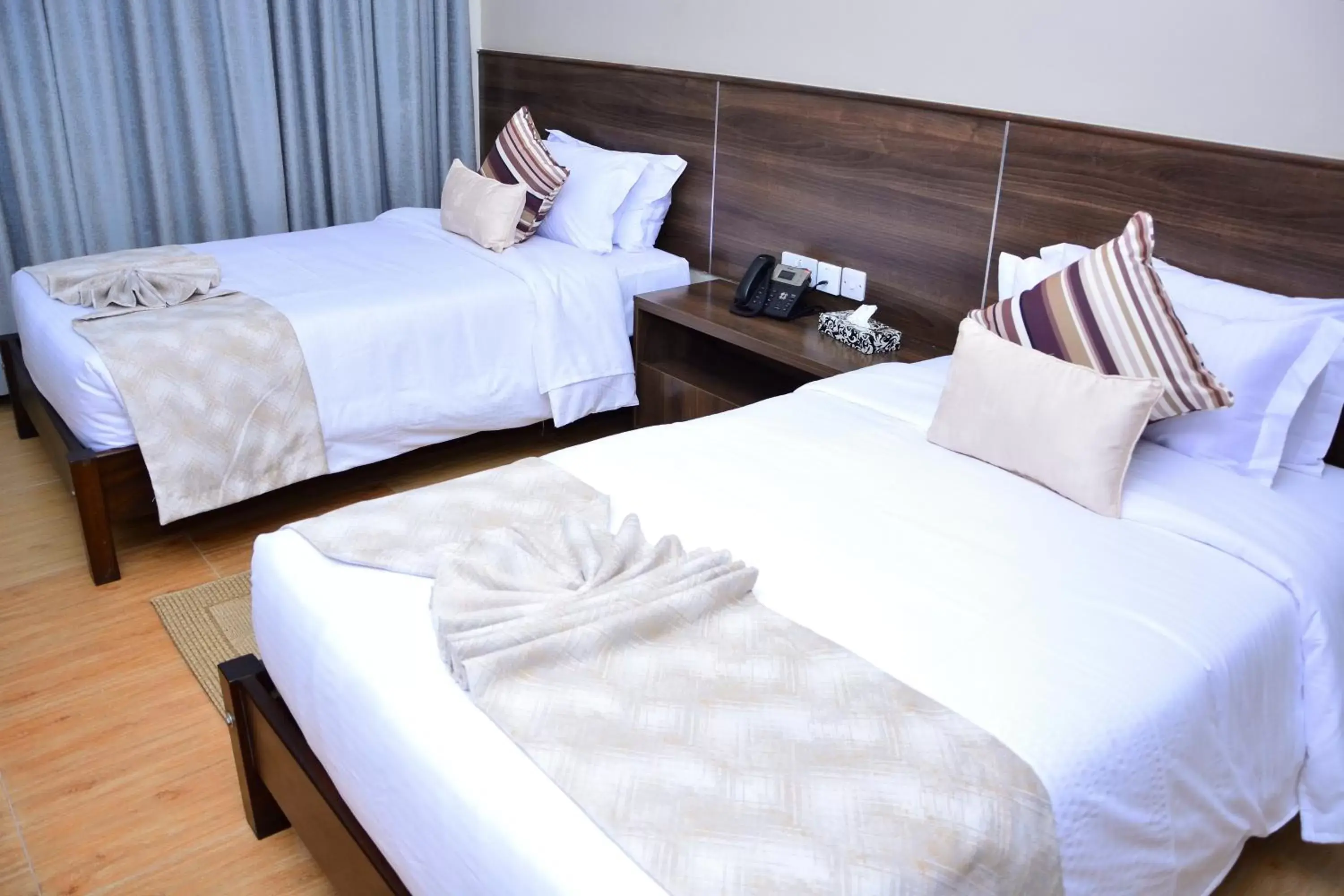 Bed in Razana Hotel