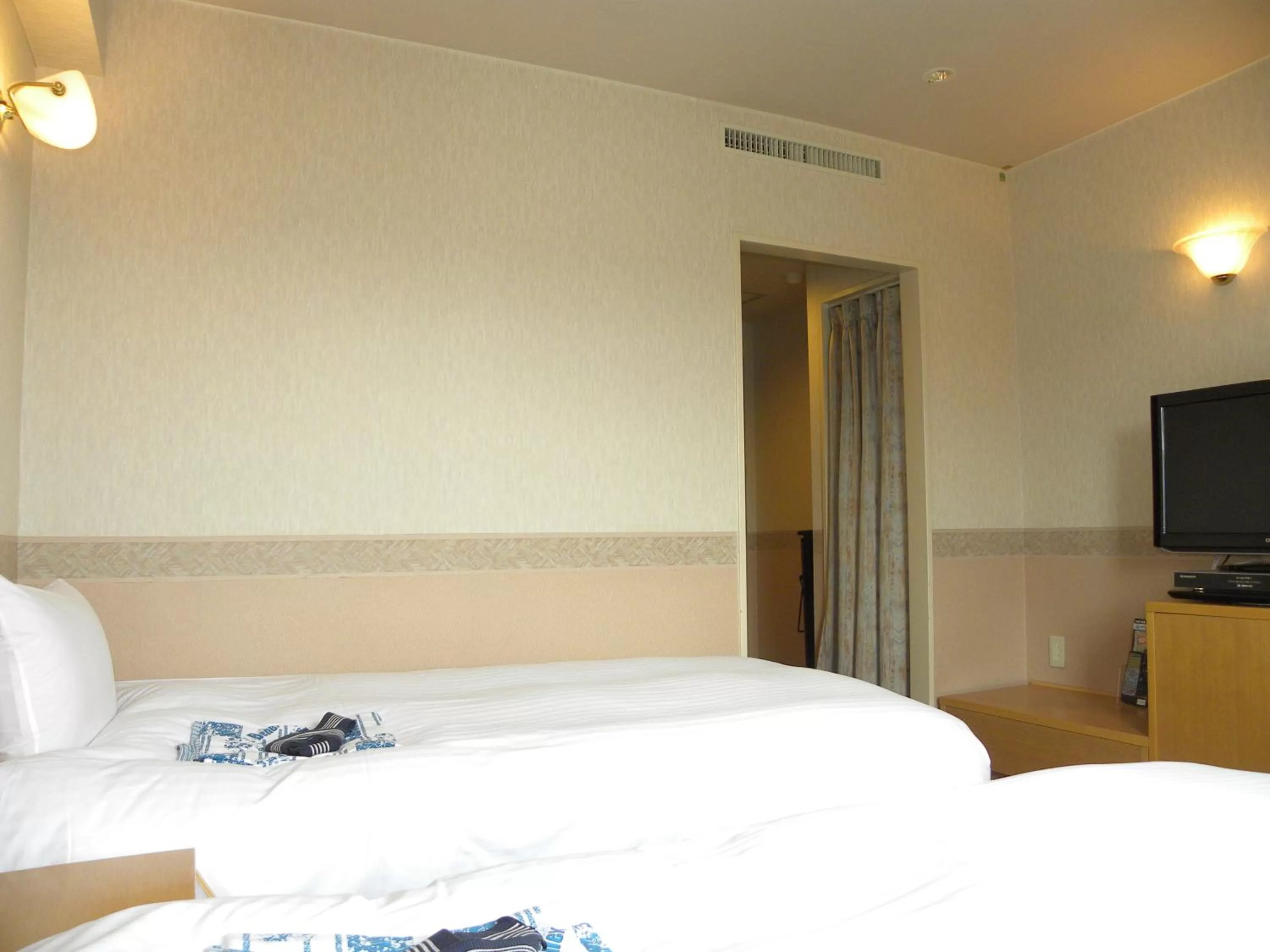 Photo of the whole room, Bed in Hotel Benex Yonezawa