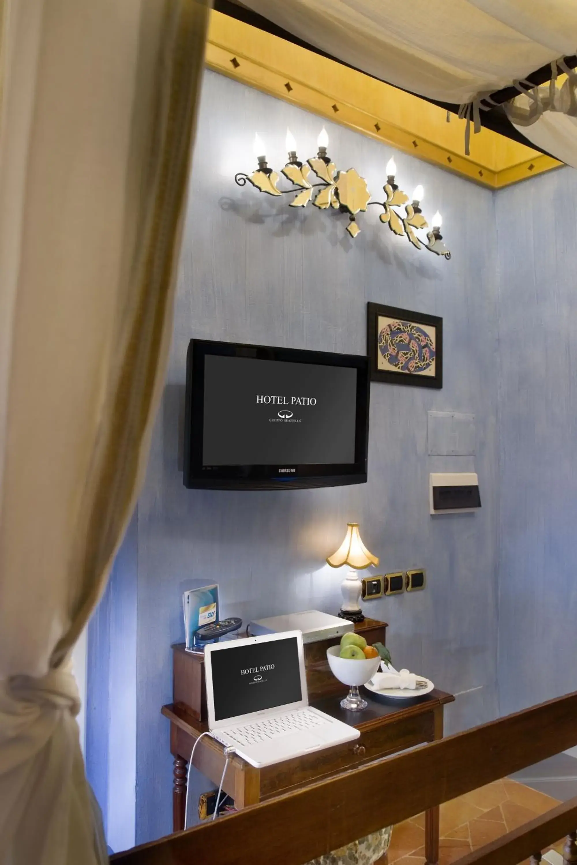 TV and multimedia, TV/Entertainment Center in Graziella Patio Hotel