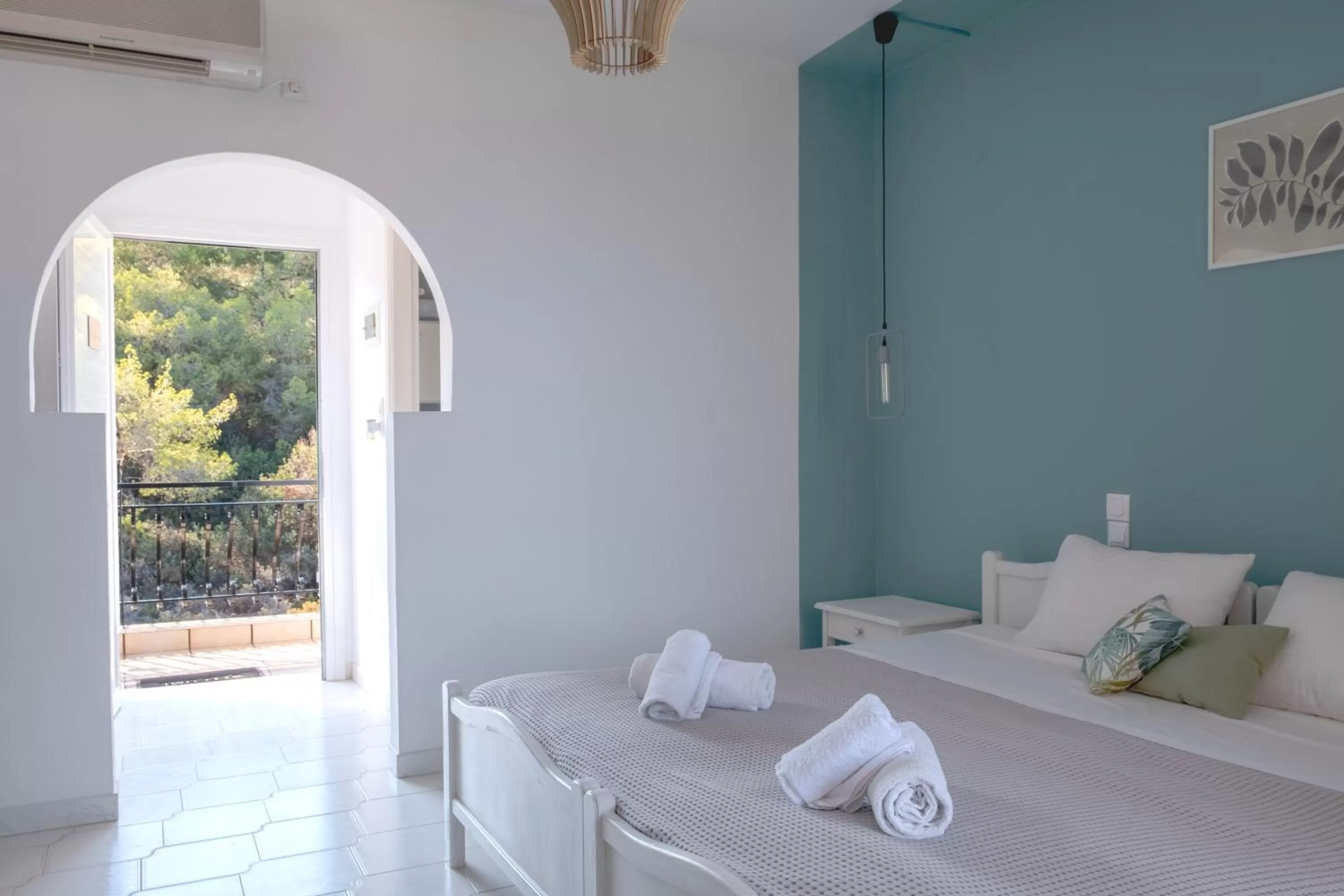 Bed in Pefkides Aegina Boutique Apartments