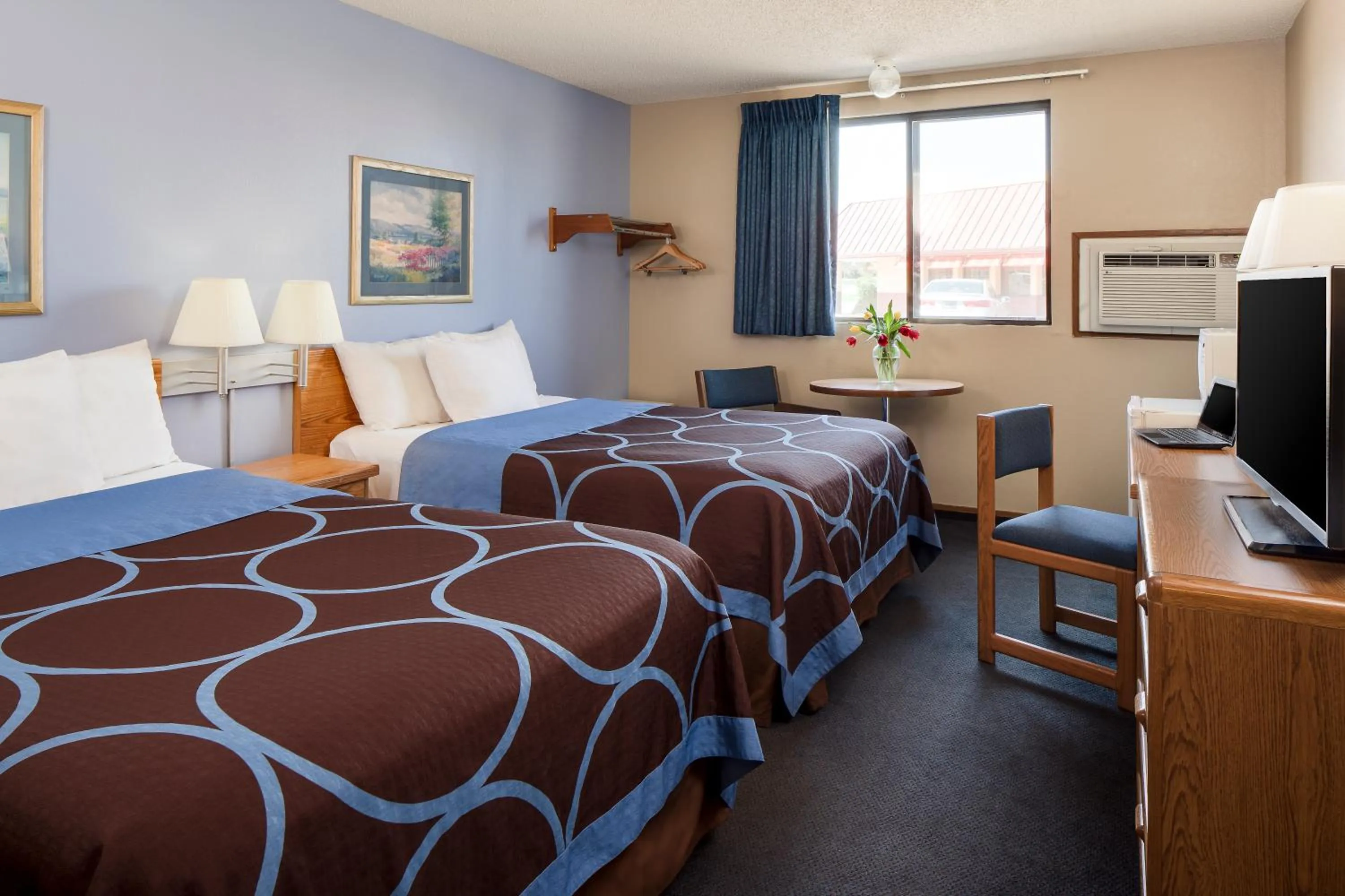 Bed in Super 8 by Wyndham Manhattan KS