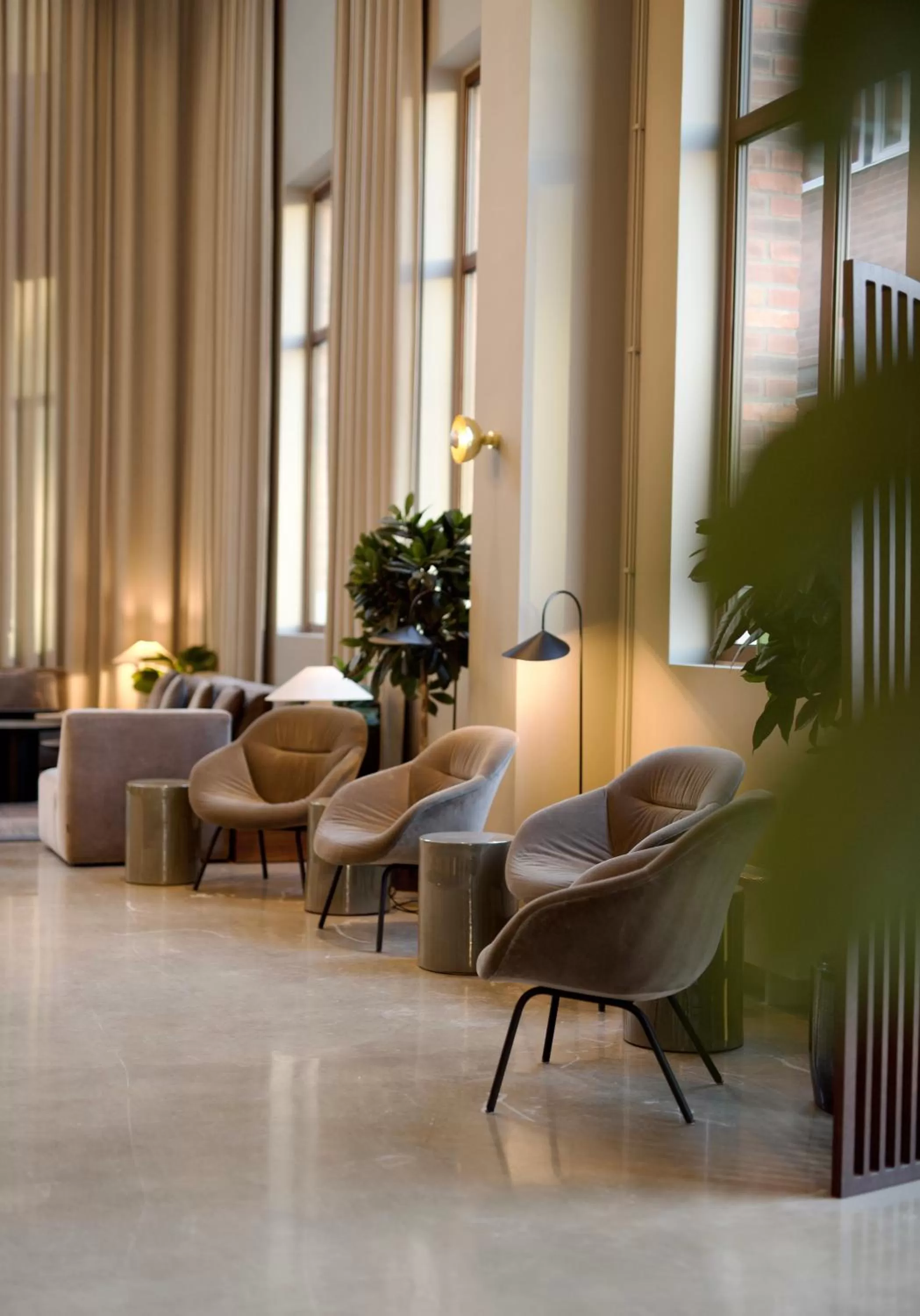 Communal lounge/ TV room in Clarion Collection Hotel Tapetfabriken