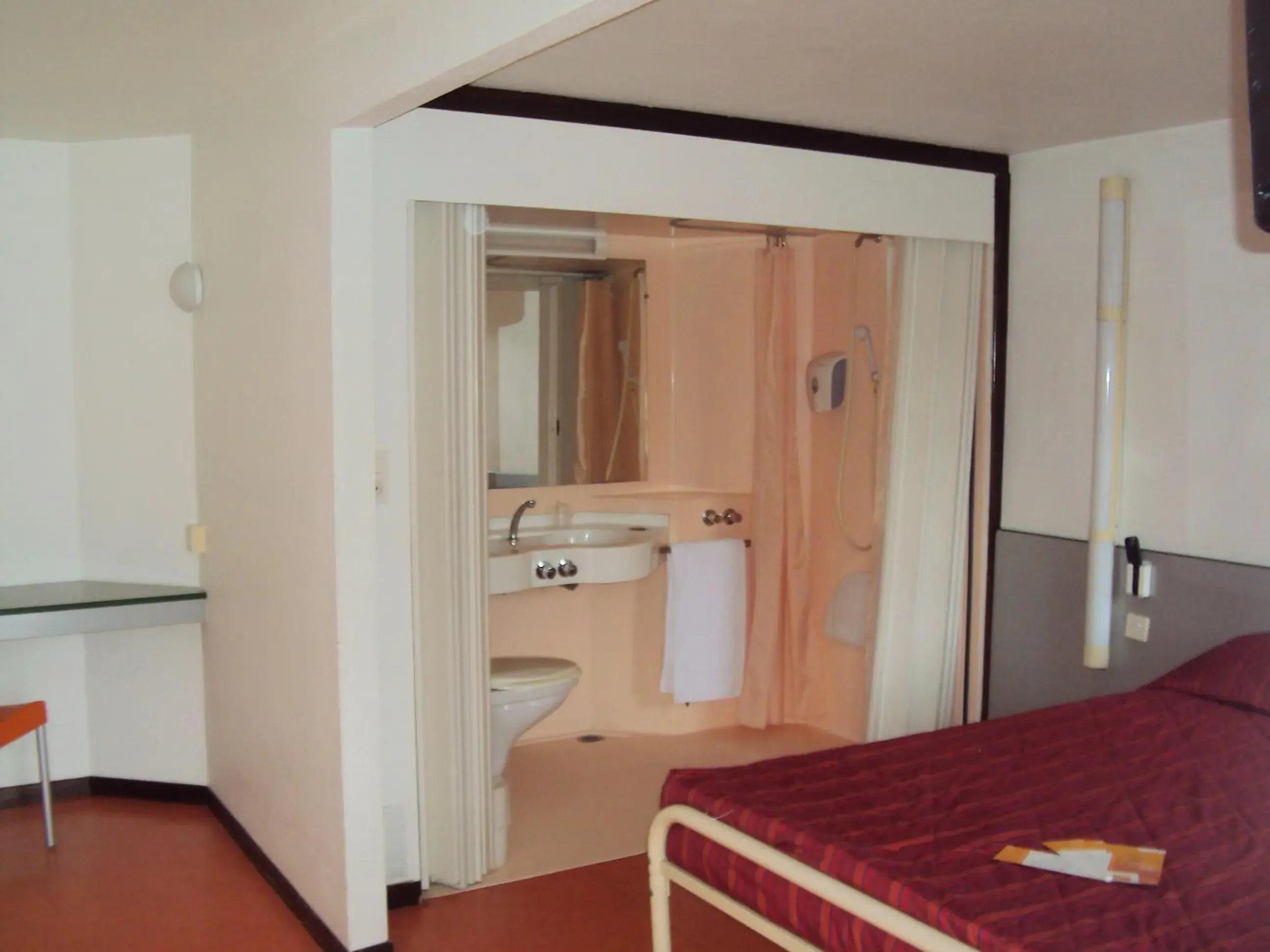 Bathroom, Bed in Premiere Classe Epinal