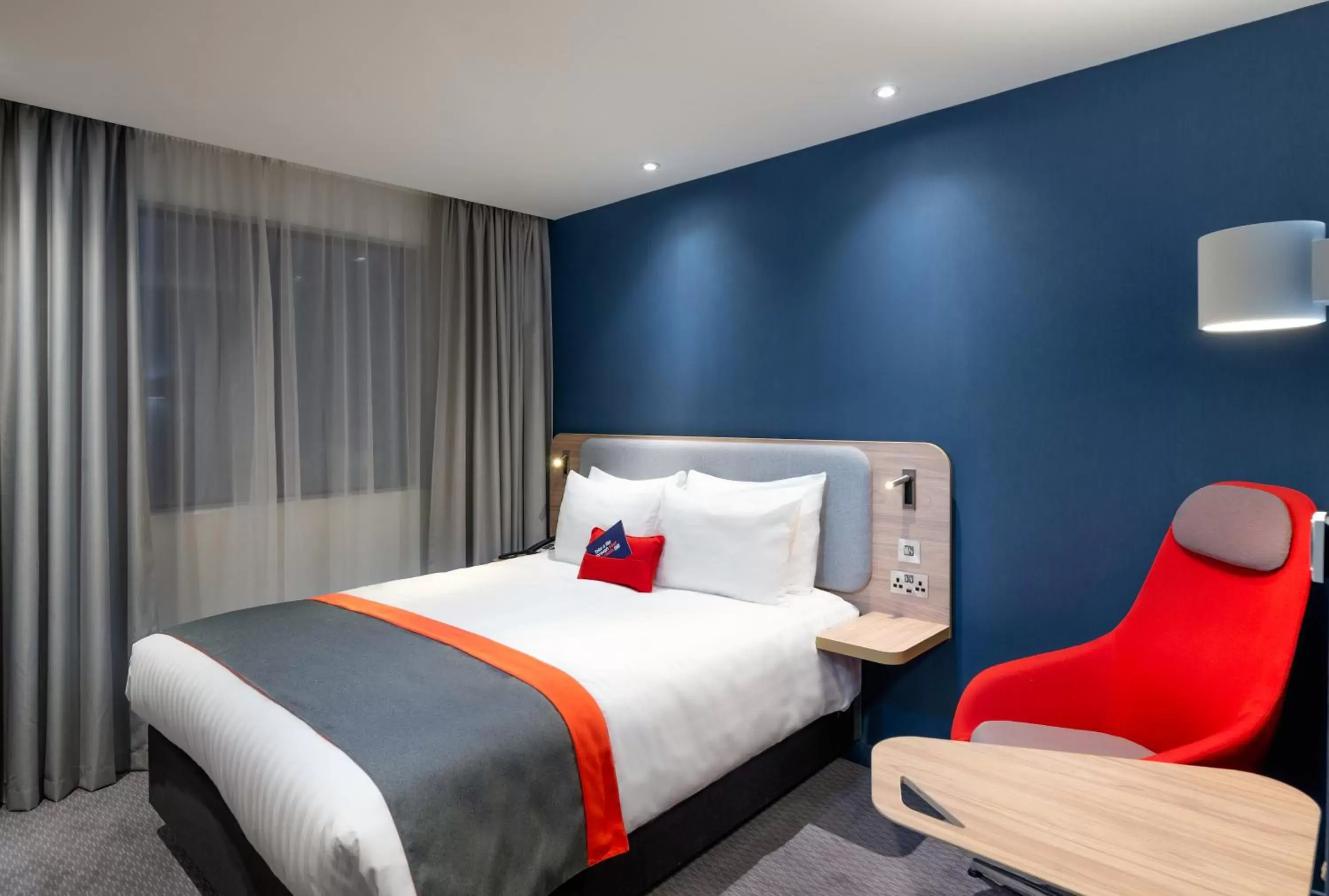 Bed in Holiday Inn Express - London Heathrow T4, an IHG Hotel
