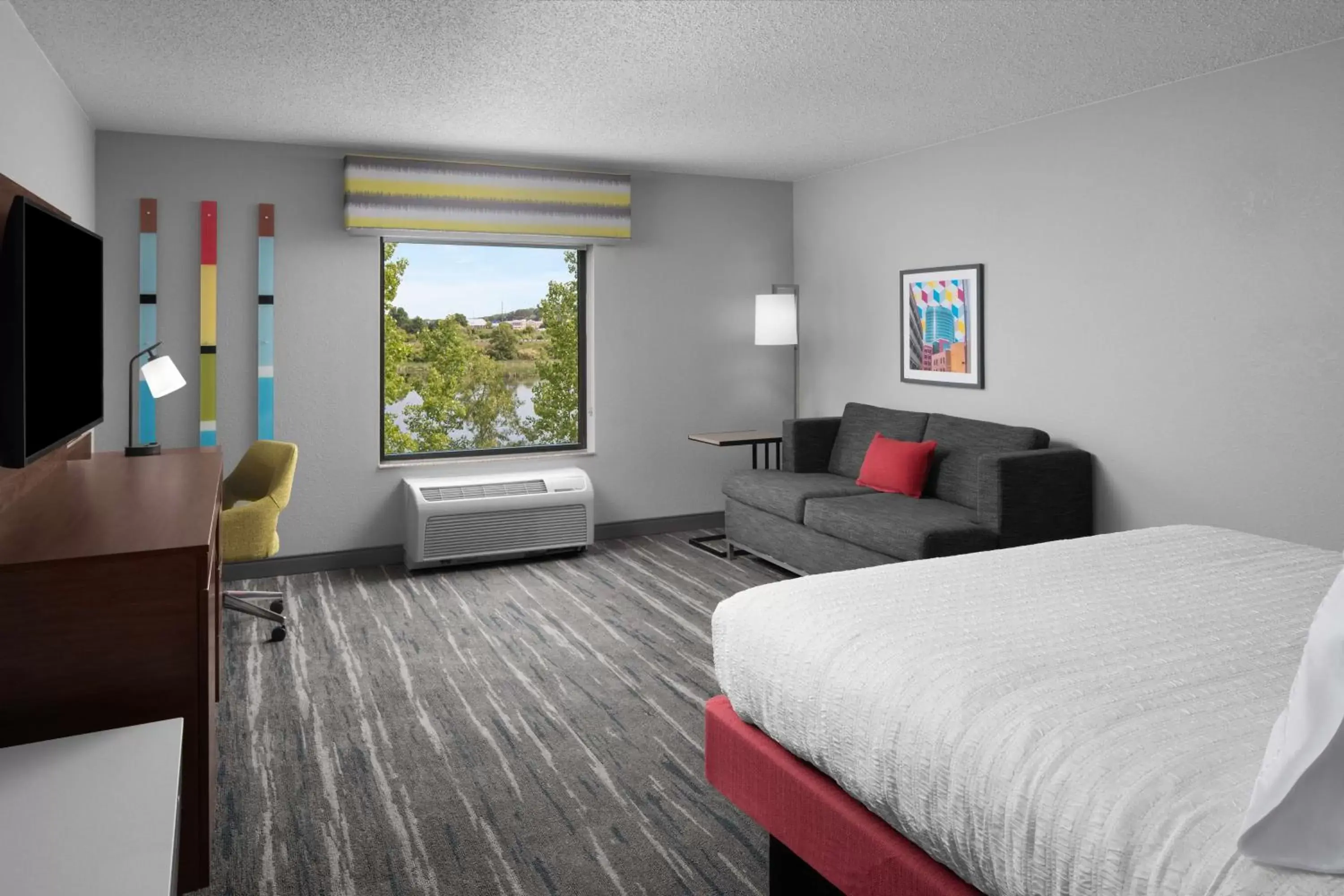 Living room, Bed in Hampton Inn & Suites Grand Rapids-Airport 28th St Living room, Bed in Hampton Inn & Suites Grand Rapids-Airport 28th St